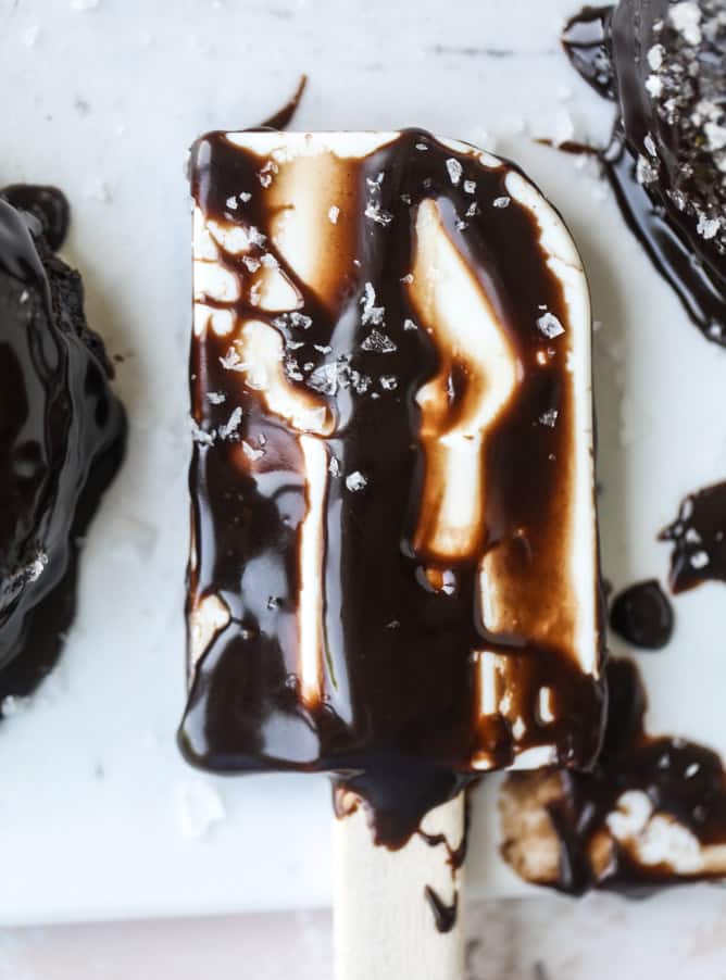 salted dark chocolate fudge donuts I howsweeteats.com #chocolate #donuts #doughtnuts #salted #fudge