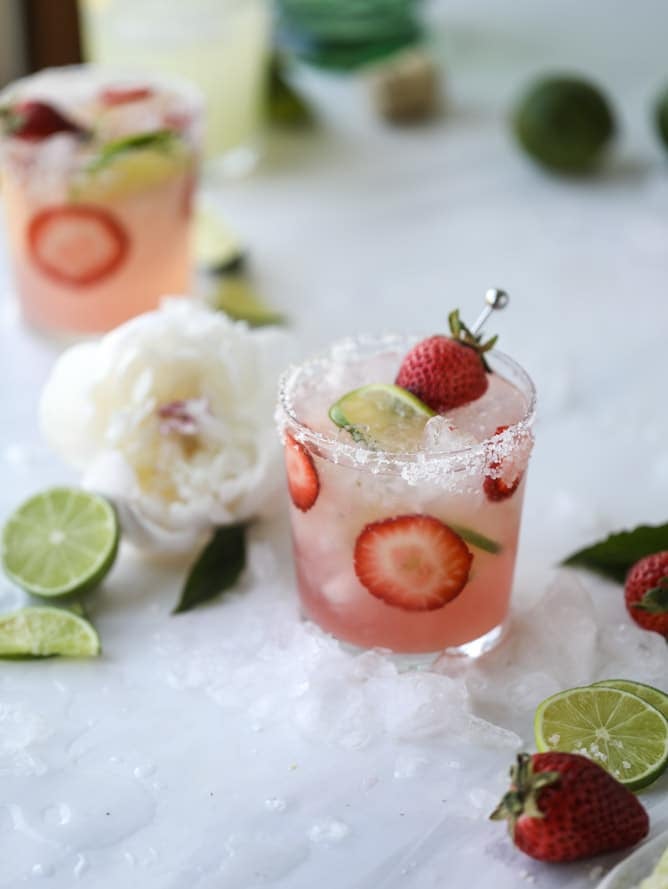 smoked strawberry mezcal margaritas I howsweeteats.com #margaritas #mezcal #strawberry #lime