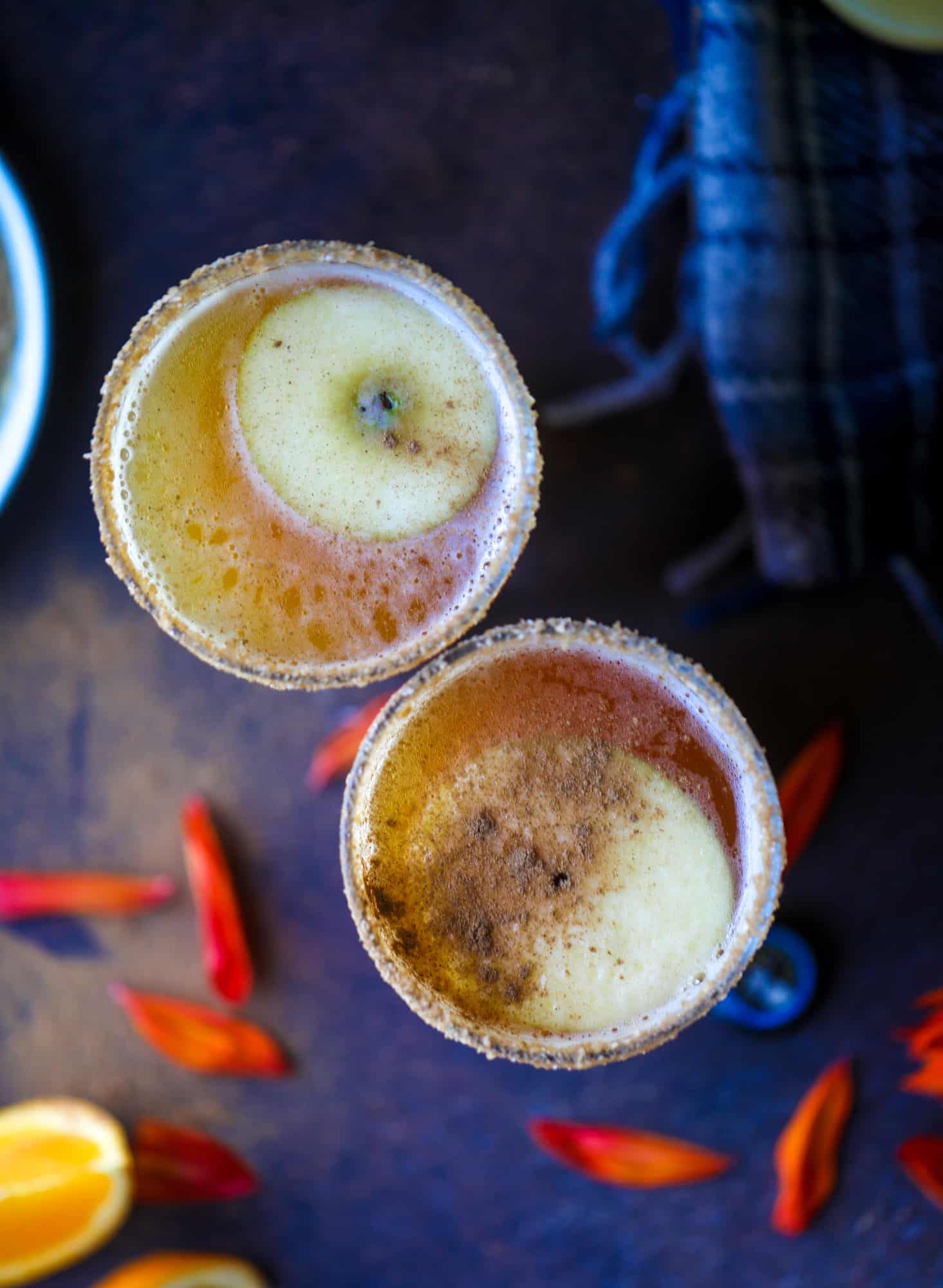 This apple cider shandy recipes is perfect for the fall season! Apple cider, sparkling cider and your favorite beer come together in an icy glass to create the best flavor ever. Finished with a cinnamon sugar rim, there's nothing better! I howsweeteats.com #apple #cider #shandy #cocktails #beer