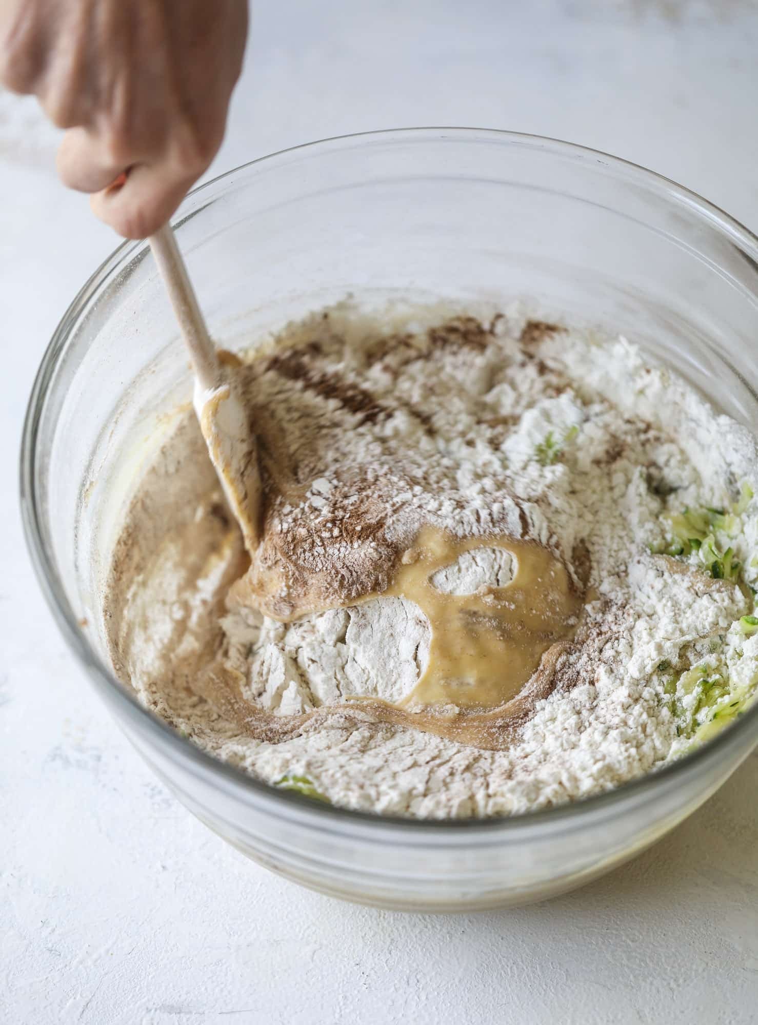 These zucchini bars with cream cheese icing are a fun twist on zucchini bread! Zucchini bars are super easy to make, have a little spice and a lot of flavor, topped with the creamiest cream cheese frosting. Delicious and simple! I howsweeteats.com #zucchini #bars #cream #cheese #icing #dessert