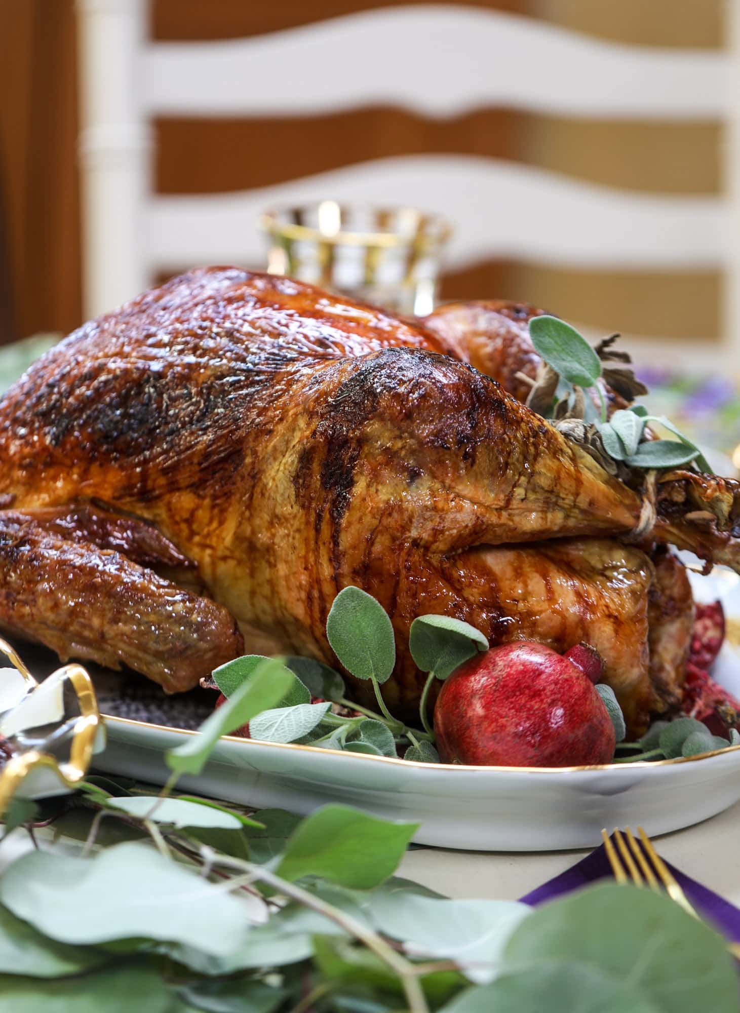 This dry brined turkey is a super easy recipe and foolproof for the perfect Thanksgiving! It's roasted with an apple cider glaze and served with the perfect gravy. You'll never make another gravy recipe again! Try this dry brined turkey for your best Thanksgiving ever! I howsweeteats.com #dry #brine #turkey #recipe #thanksgiving #gravy