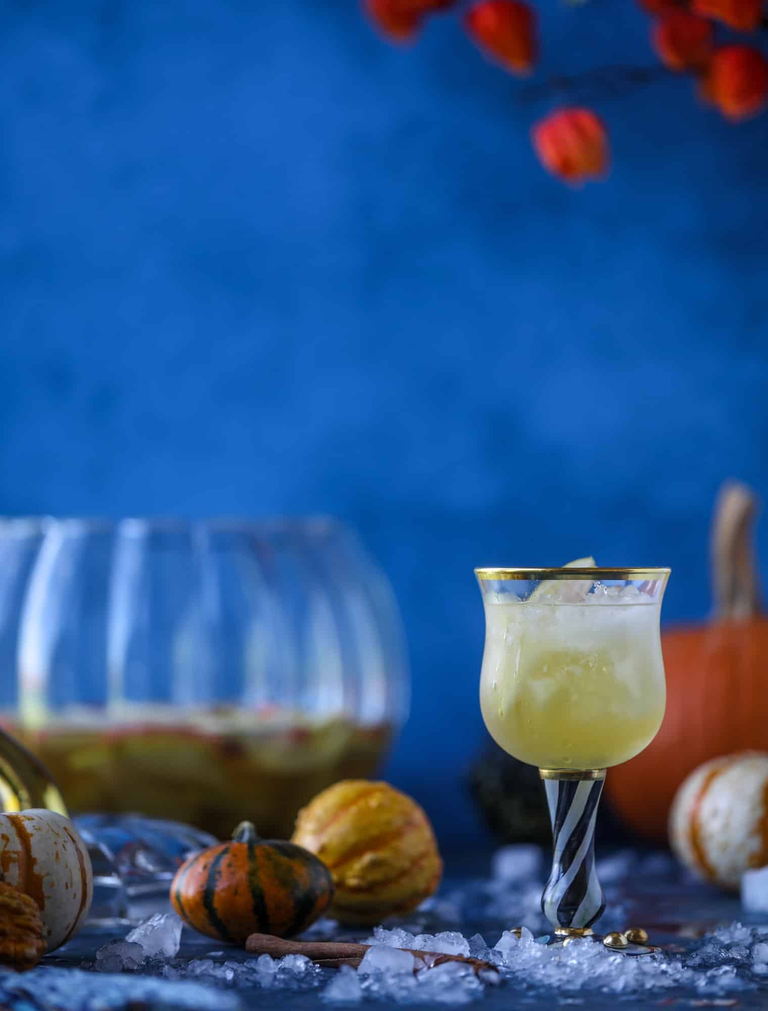 This pumpkin sangria is perfect for the fall and holiday season! A homemade pumpkin pie syrup gives the drink excellent flavor along with bubbles and apple cider and of course, boozy fruit. It's a favorite for Halloween or Thanksgiving! I howsweeteats.com #pumpkin #sangria