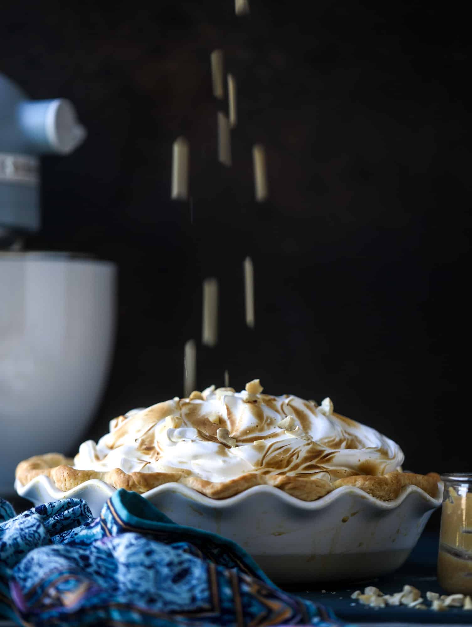 This peanut butter pie recipe is almost identical to the one that my grandmother made when I was a crust. Flaky pastry crust is what makes this pie different, along with a creamy no-bake peanut butter filling that is rich and decadent! I howsweeteats.com #peanutbutter #pie