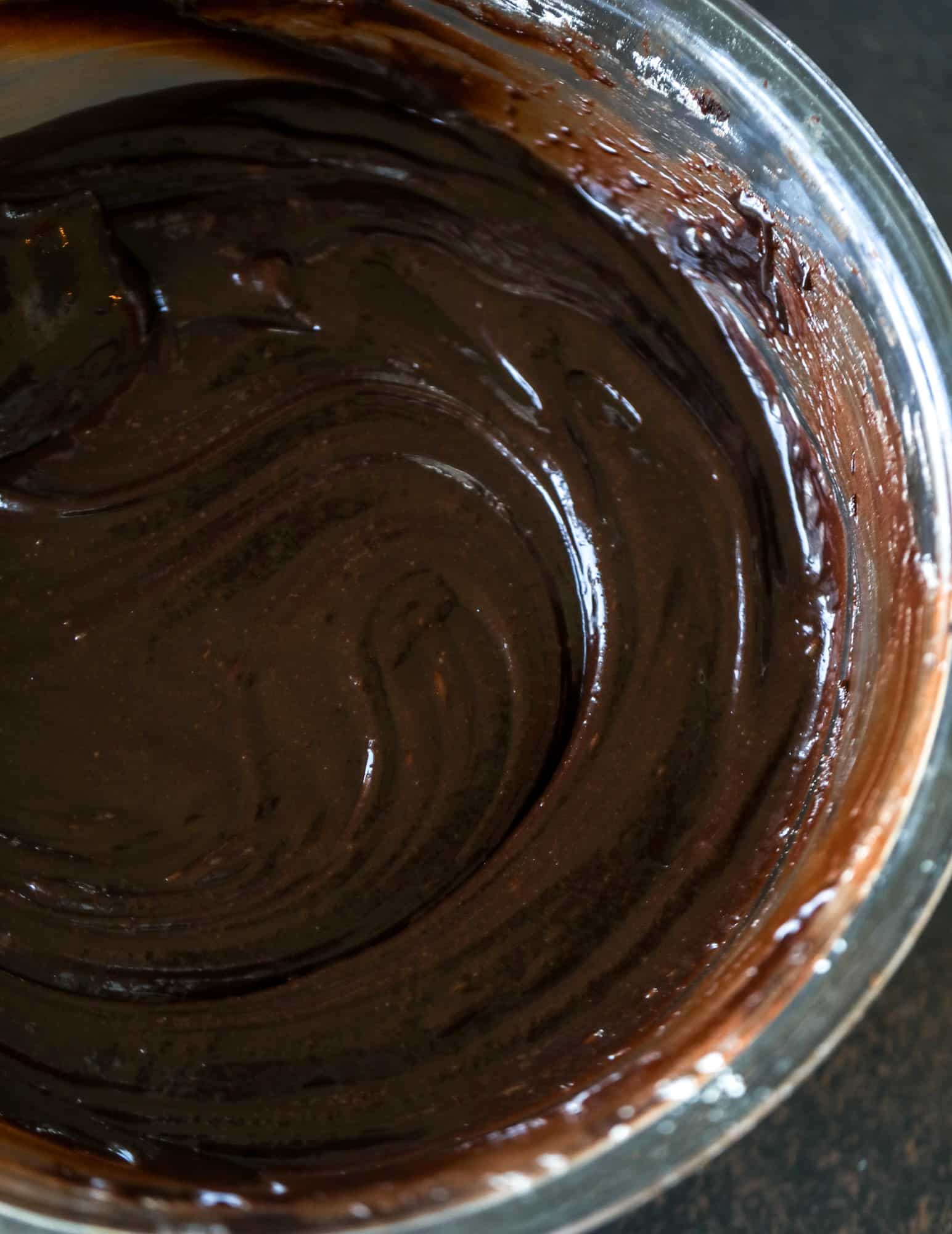 These pumpkin brownies have a fudgy layer of chocolate on the bottom and a silky layer of pumpkin on top! They are so delicious and rich and perfect for fall. The pumpkin brownies come together easily and can be made ahead of time too! I howsweeteats.com #pumpkin #brownies