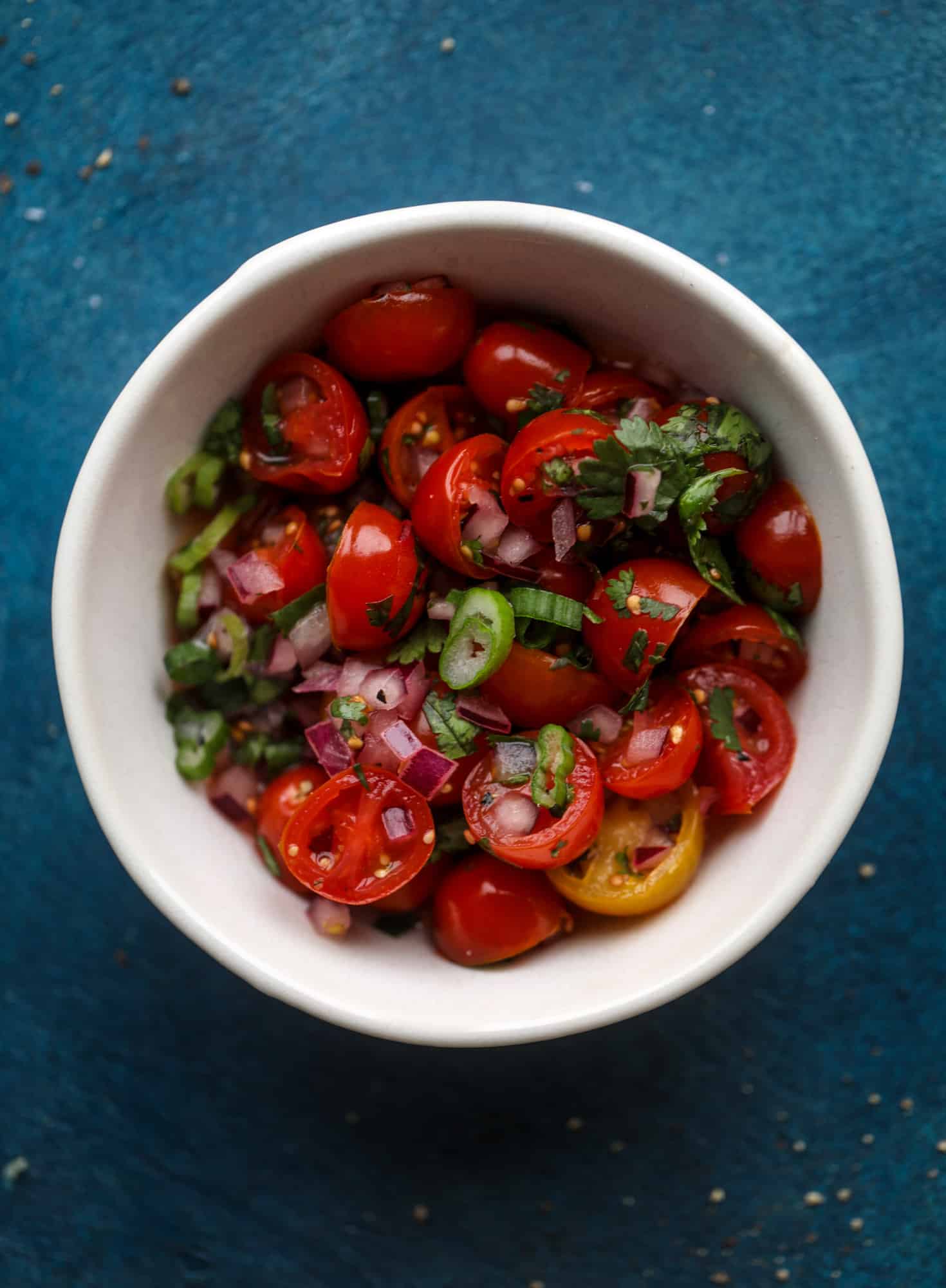 Saucy baked black bean taquitos have a crunchy outside and a creamy, flavorful inside. Served with a pico de gallo, they are an easy weeknight meal! I howsweeteats.com #baked #taquitos
