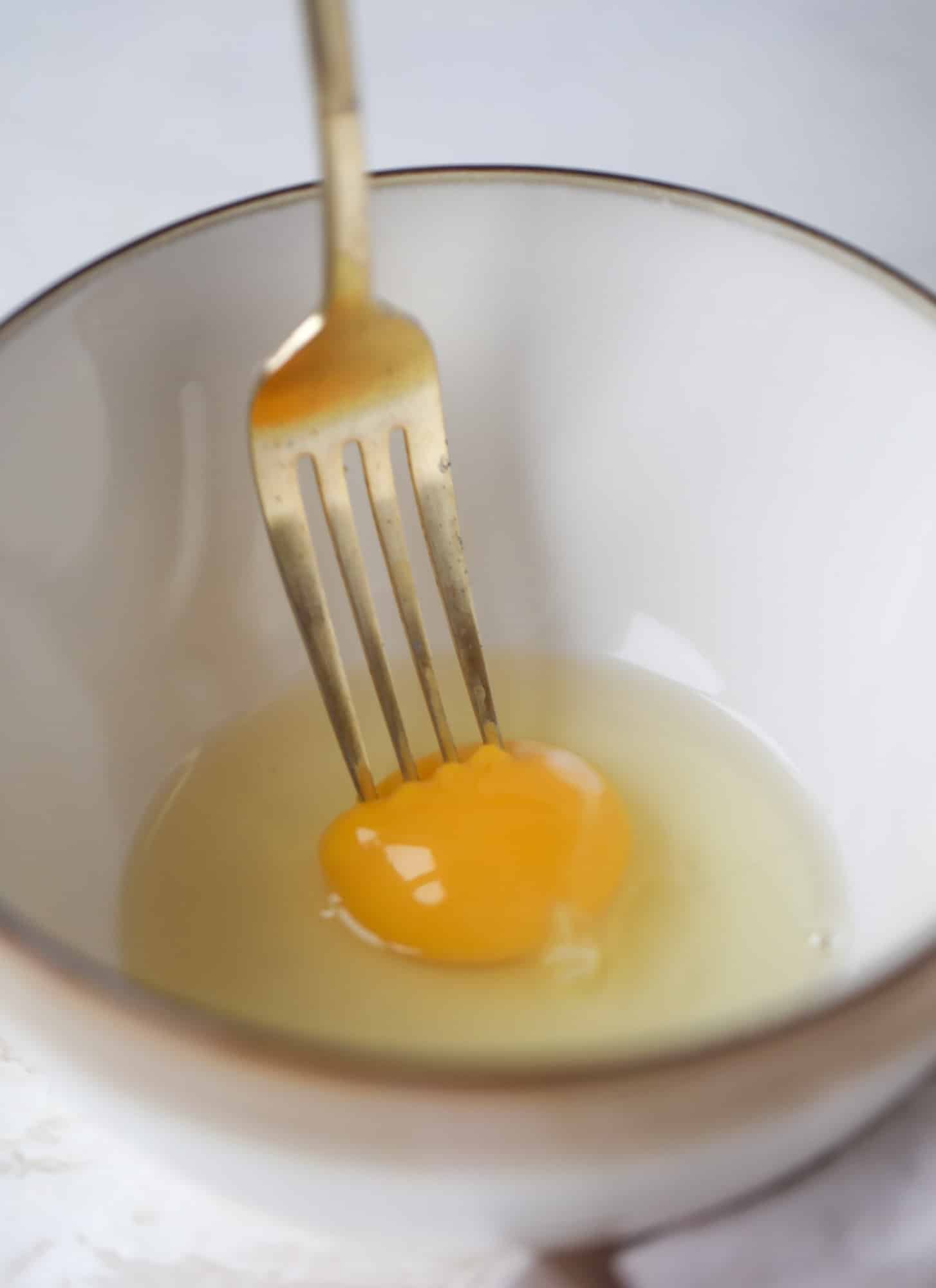 This chicken noodle egg drop soup is the ultimate comfort food! Homemade stock and satisfying ingredients provide the best nourishment and comfort! I howsweeteats.com #chicken #noodlesoup