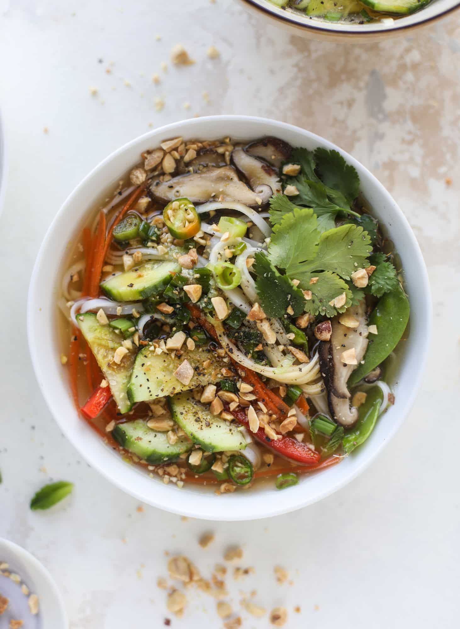 Ginger scallion noodle bowls are a flavorful, comforting vegetarian meal that can be customized to include any veggies you love! I howsweeteats.com #noodle #bowls