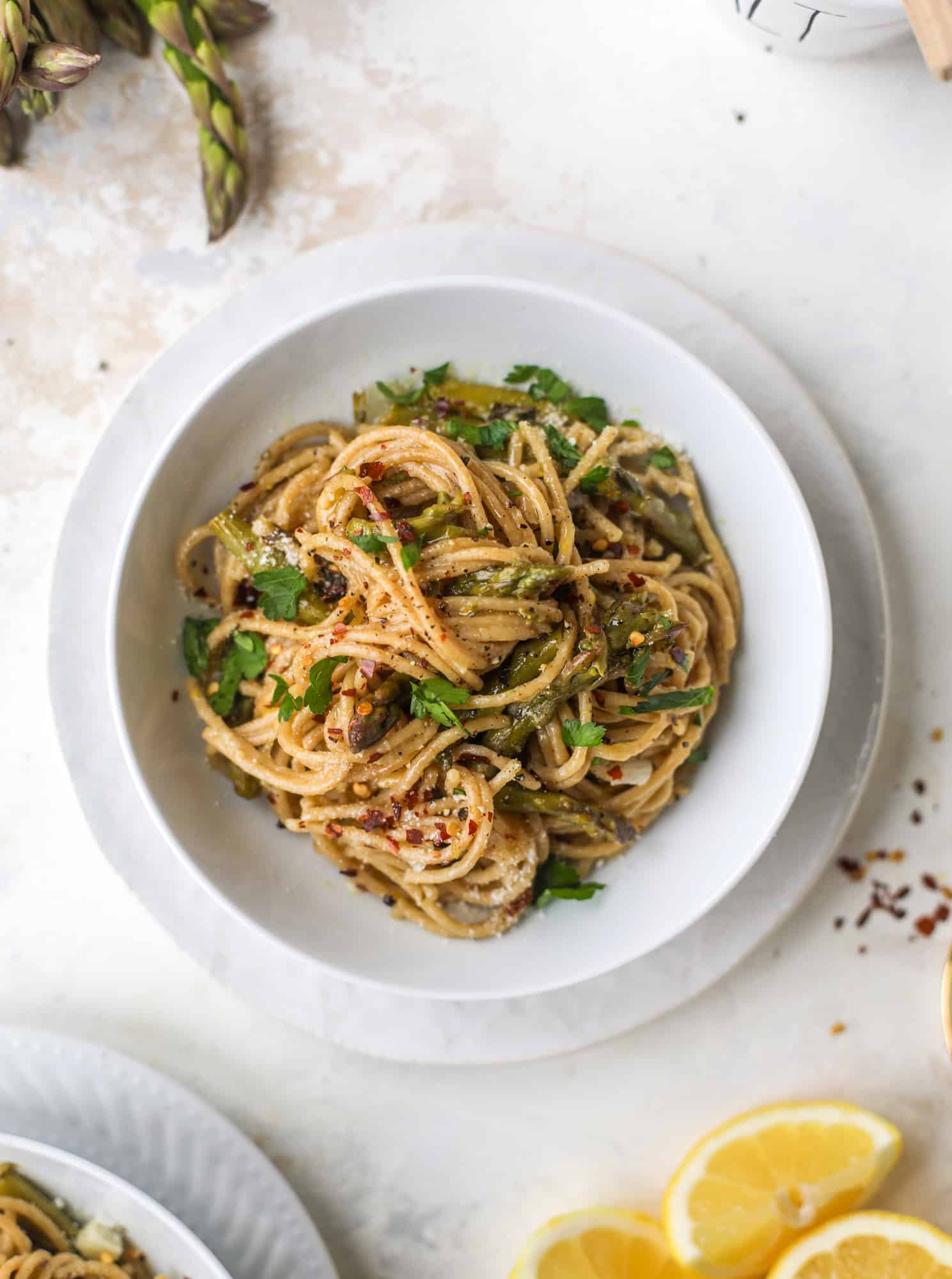 A perfect one pot pasta made with asparagus, shallots, lemon and mascarpone chese. The best weeknight dinner that comes together in a snap! I howsweeteats.com #asparagus #onepotpasta
