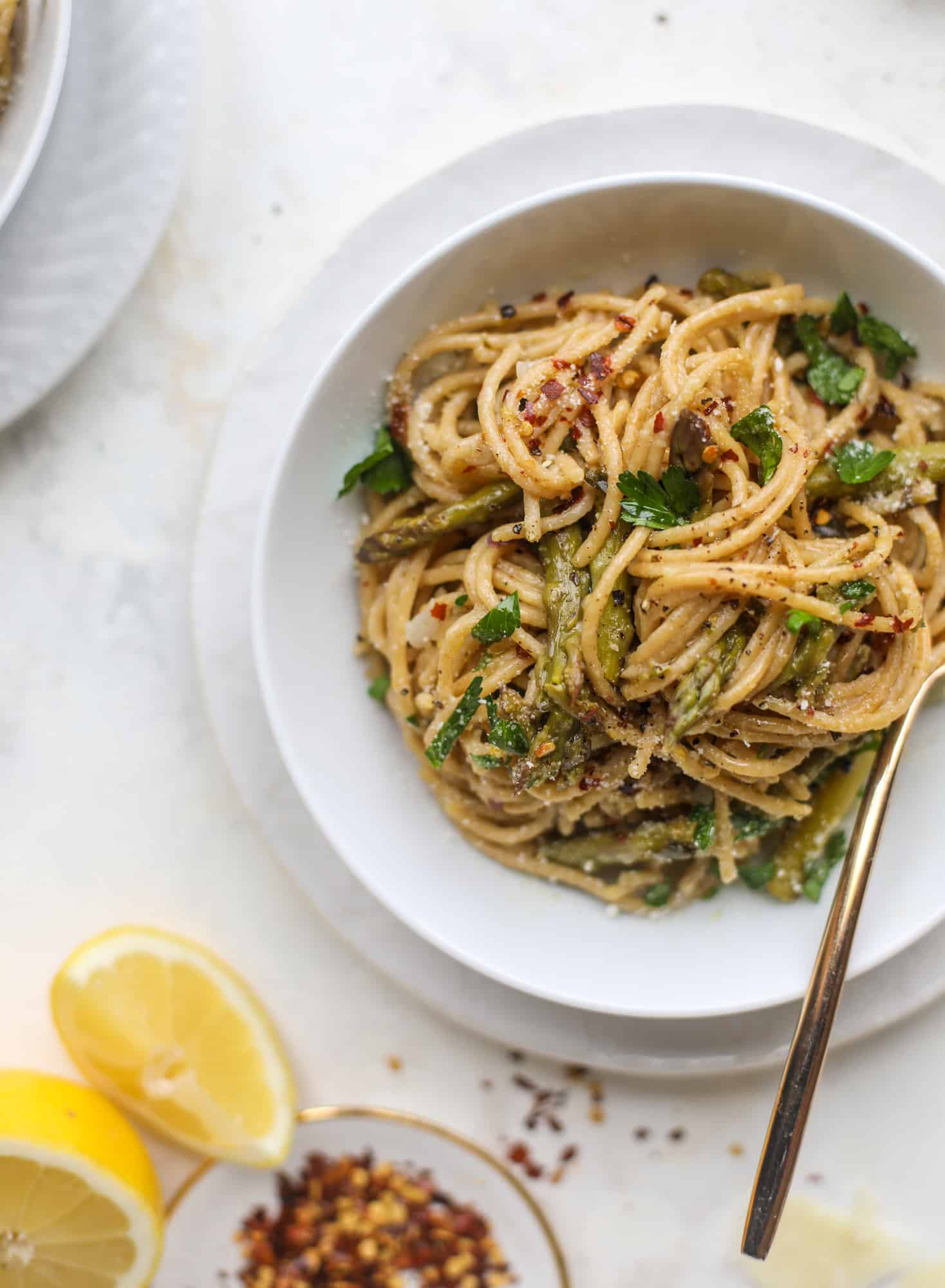 A perfect one pot pasta made with asparagus, shallots, lemon and mascarpone chese. The best weeknight dinner that comes together in a snap! I howsweeteats.com #asparagus #onepotpasta