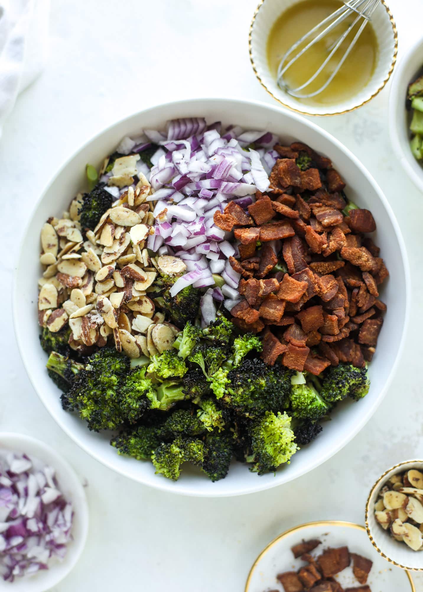 My favorite broccoli salad is here! This broccoli crunch salad is full of grilled broccoli, sliced almonds, diced scallions and crunchy bacon. It's so good!