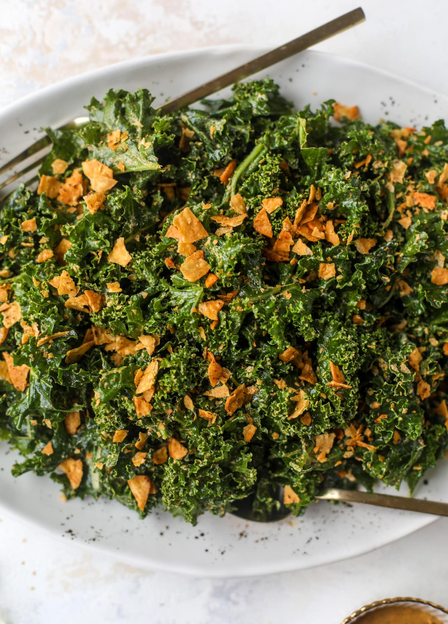 This cool ranch kale salad is loaded with all the flavor of our favorite chips. Simple enough to serve with almost everything, it's ridiculously flavorful!