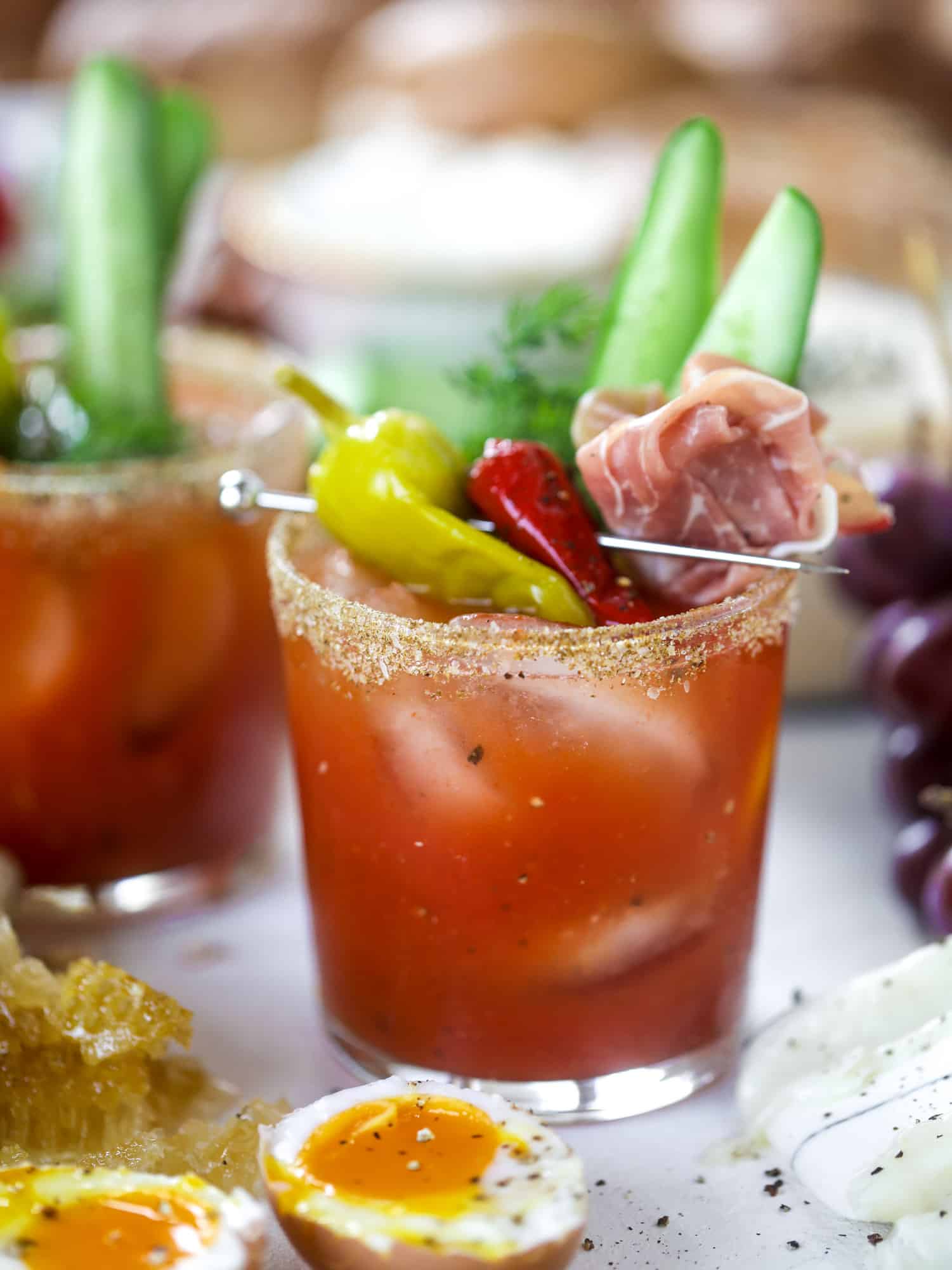 The highlight of this Easter brunch board are the deviled eggs and soft boiled eggs! Add some avocado toast, donuts and bloody marys and you've arrived. I howsweeteats.com #brunch #board