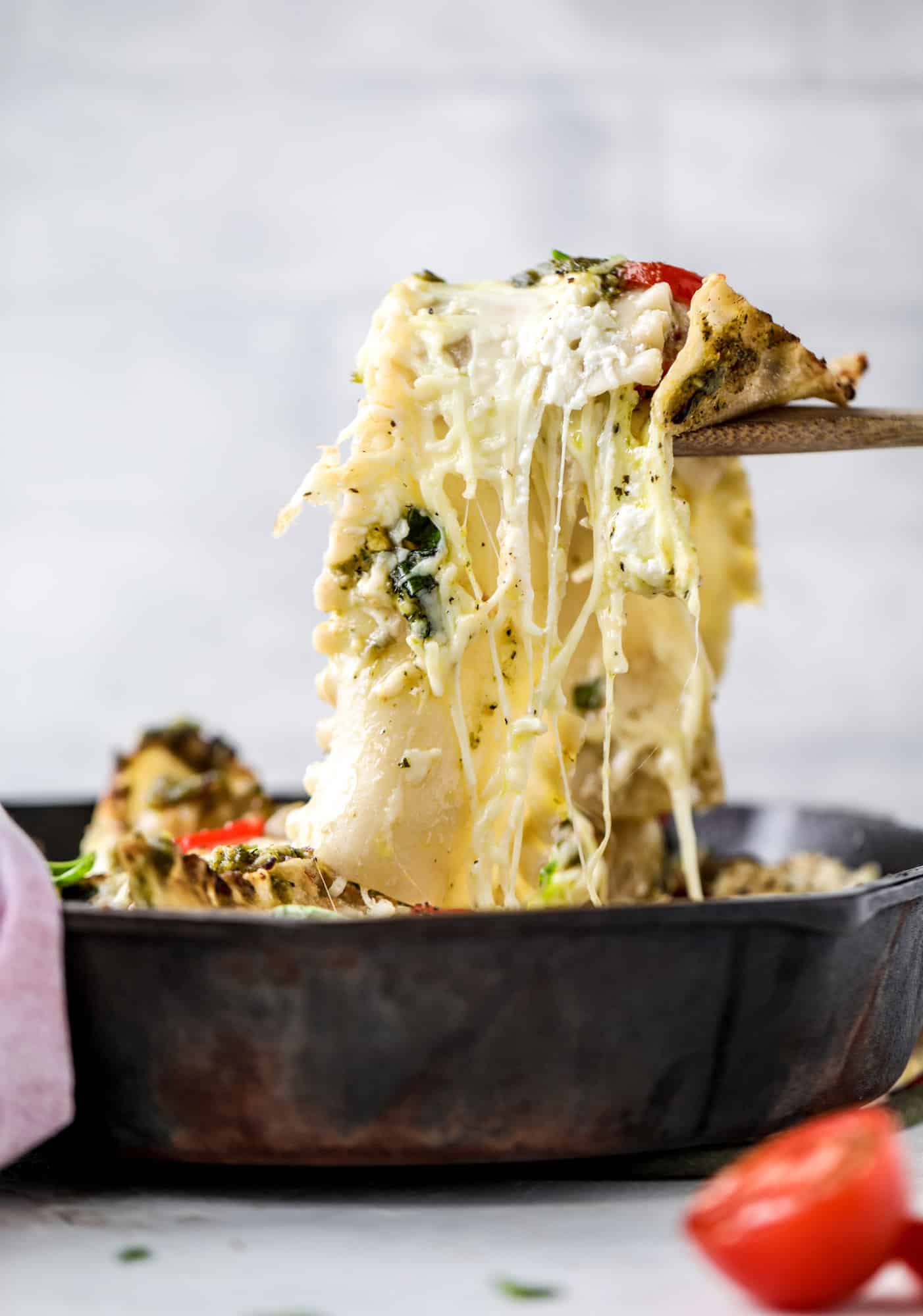 Quick caprese skillet lasagna is a lovely and comforting summer meal! Lots of fresh basil, ripe tomatoes and cheese bring this easy weeknight meal together.