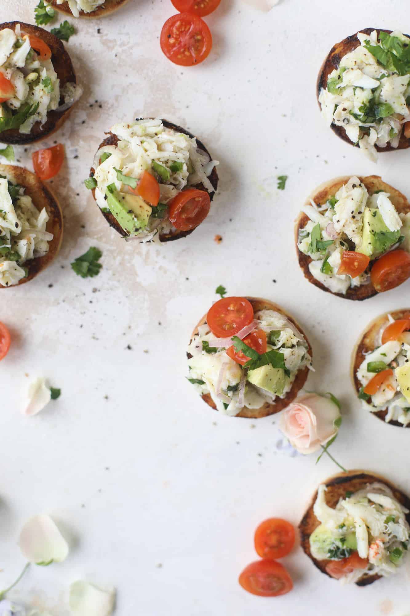 The cutest crab salad toasts are perfect for a snack, appetizer or light meal with a greens salad. This avocado crab salad is so refreshing and light!