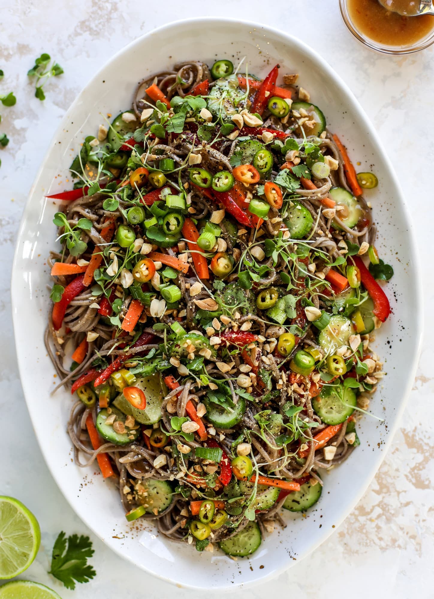 This grilled thai pork tenderloin is so easy, super flavorful, and the perfect weeknight meal when you serve it with a soda noodle salad. soba noodle salad