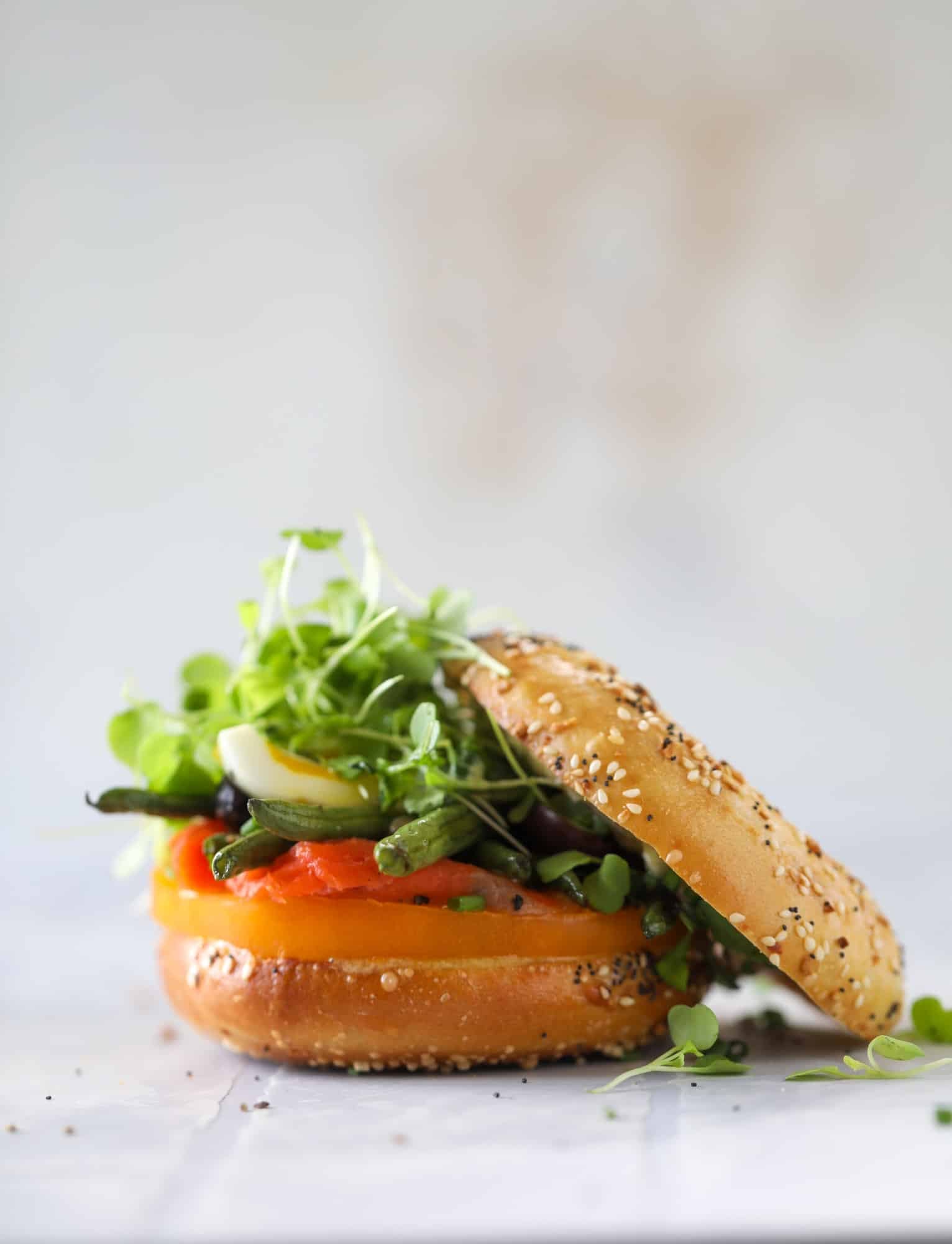 These nicoise bagels are a spin on my favorite salad! Loaded with smoked salmon, blistered green beans and tons of goodness. They are delish!