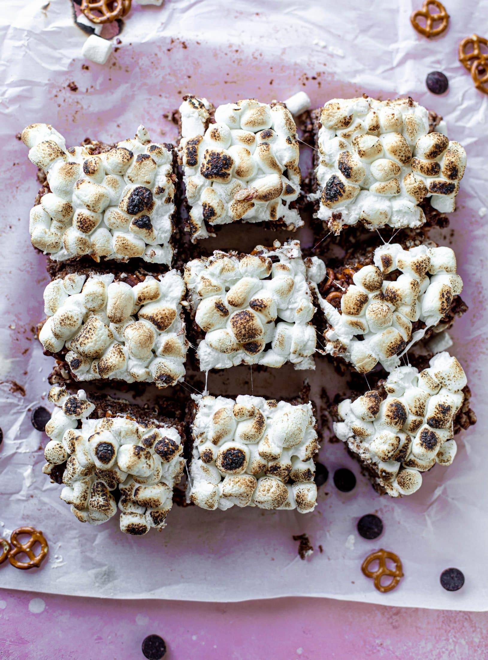 These indulgent s'mores bars are crispy and crunchy and studded with salted pretzels! Toasted marshmallow and dark chocolate make these the best treat ever!