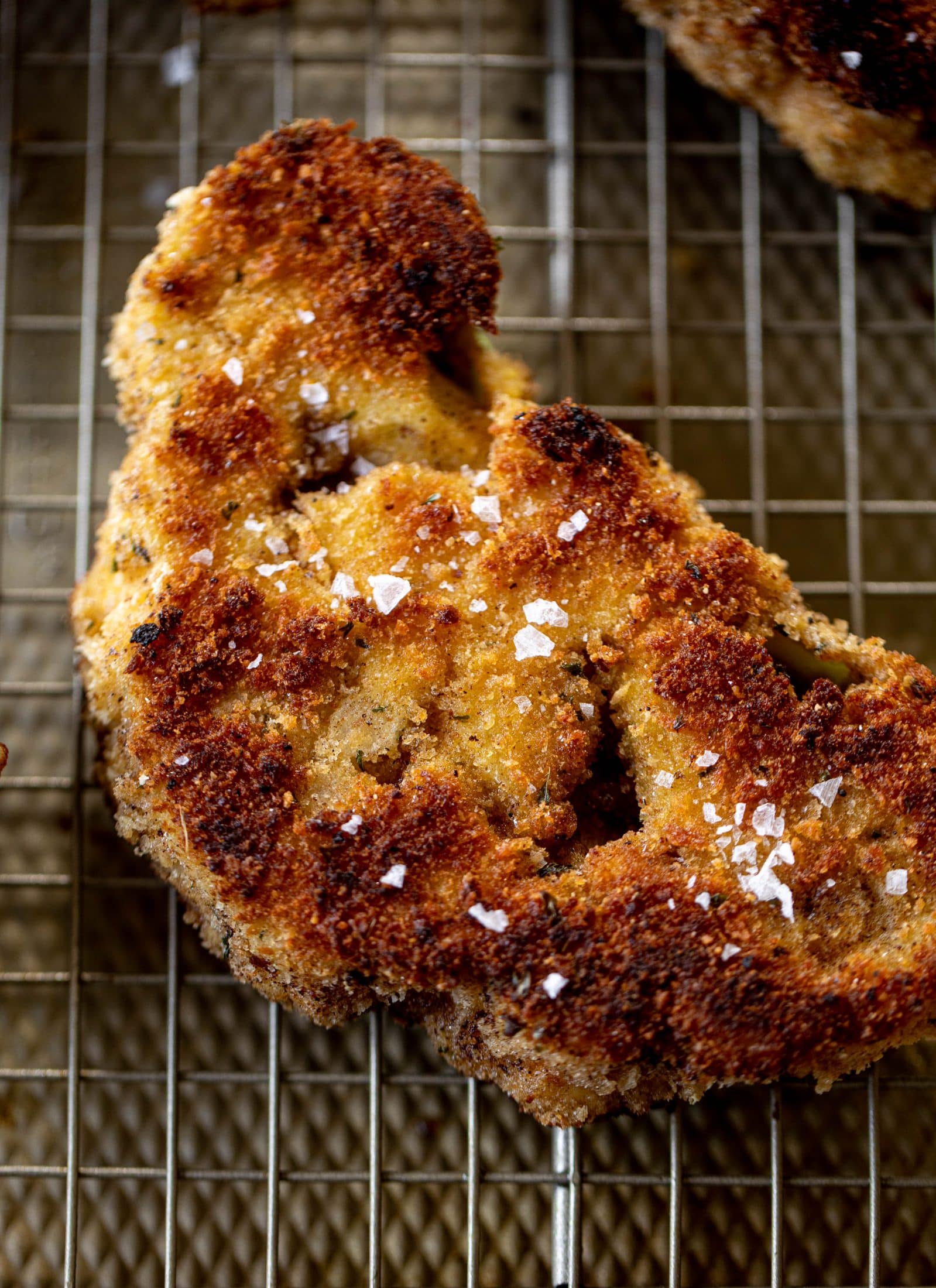 These cauliflower schnitzel sandwiches are full of flavor! Crispy cauliflower, caramelized onion mayo, pickled cabbage and microgreens. Delish!