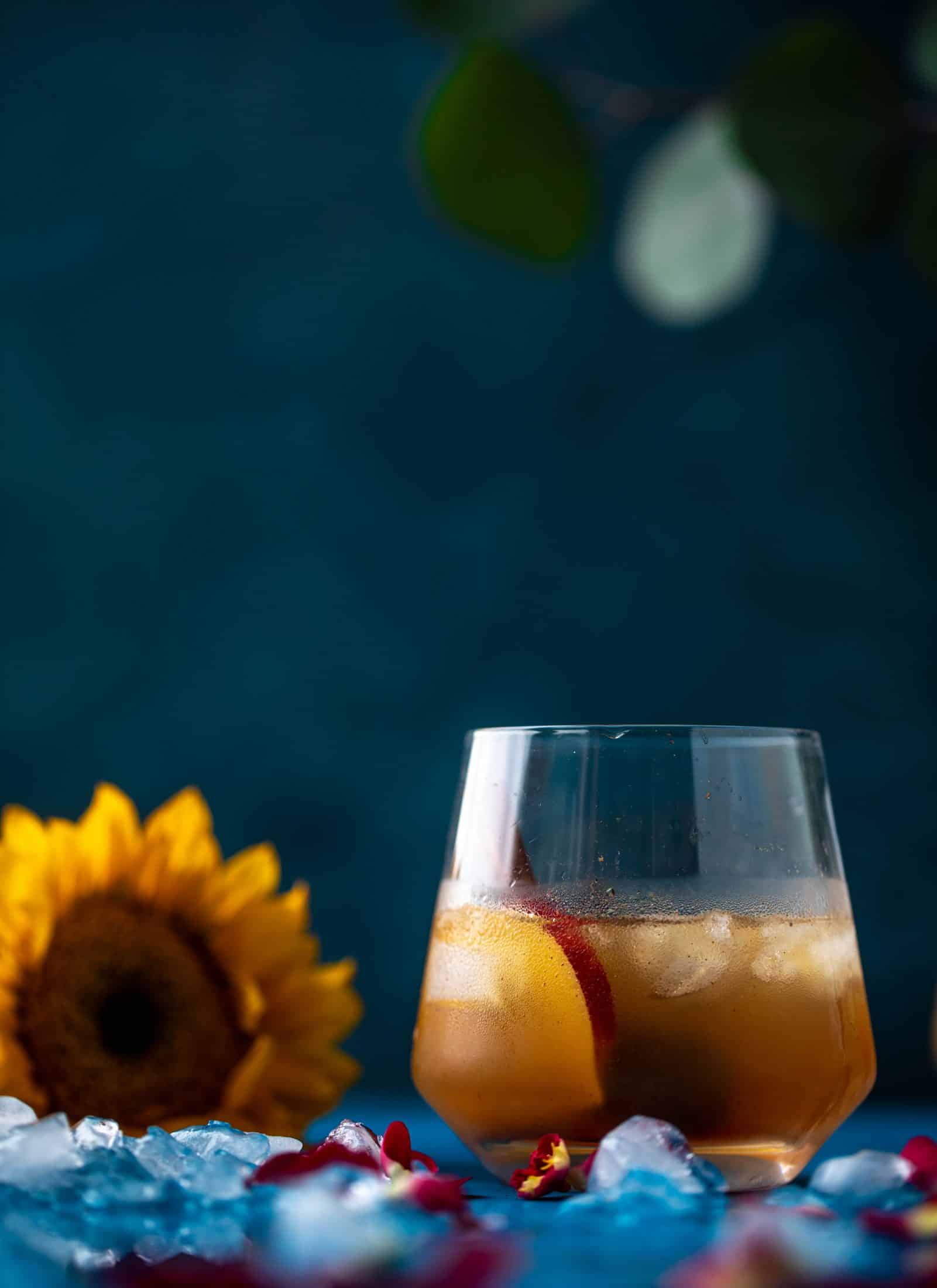 Everything I love about fall is in one little cocktail right here! If you love whiskey, this cinnamon spiced cider and splash of maple makes a sour so good!