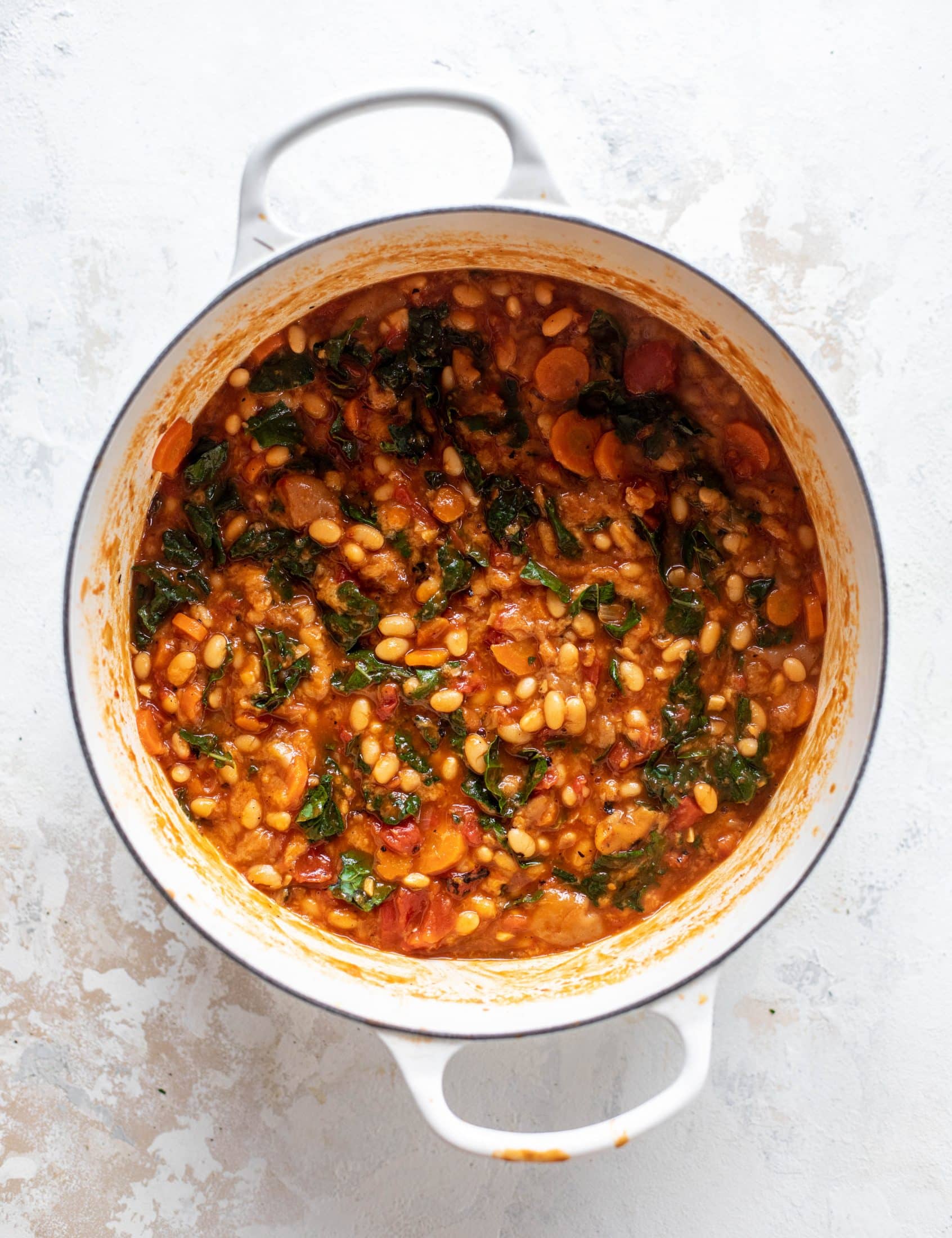 This tuscan tomato bread soup is super hearty, satisfying and delicious! Leftovers are a hit and you will find yourself craving this in the cooler months.