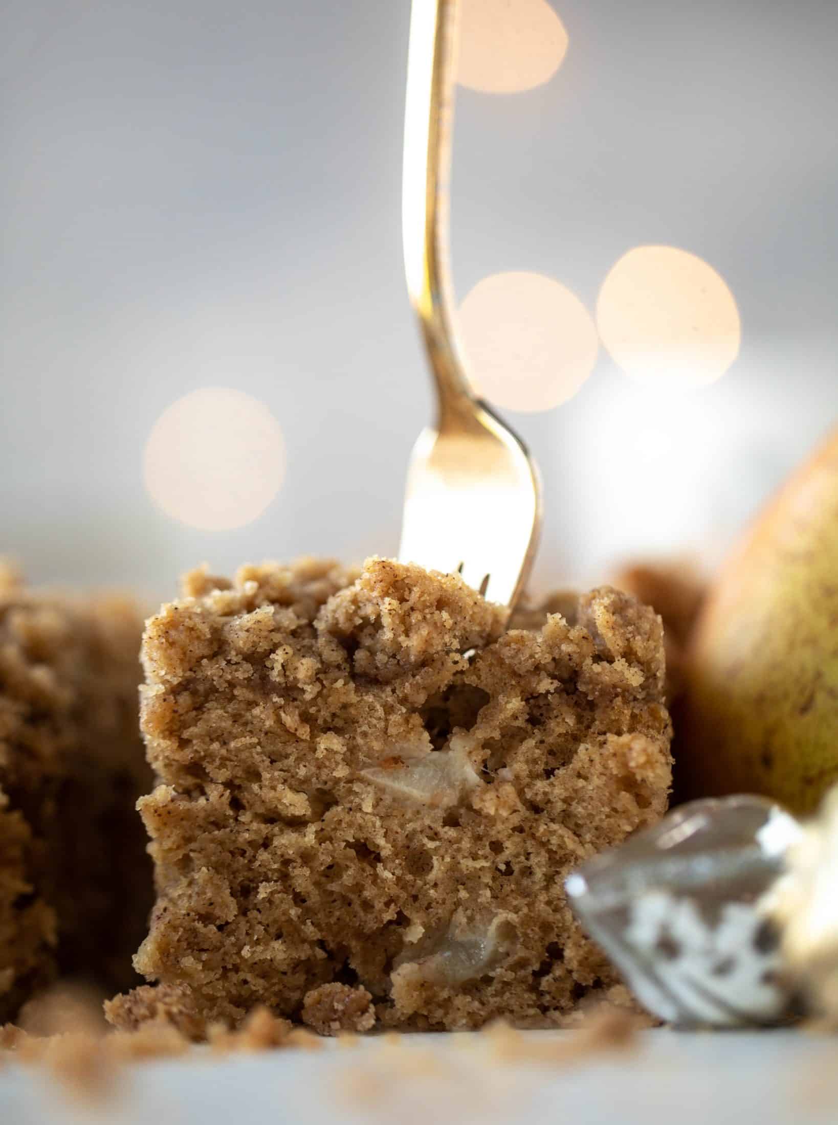 A pear coffee cake made with brown butter and greek yogurt. It's delicious for breakfast or brunch and the crumb topping is unbelievable.