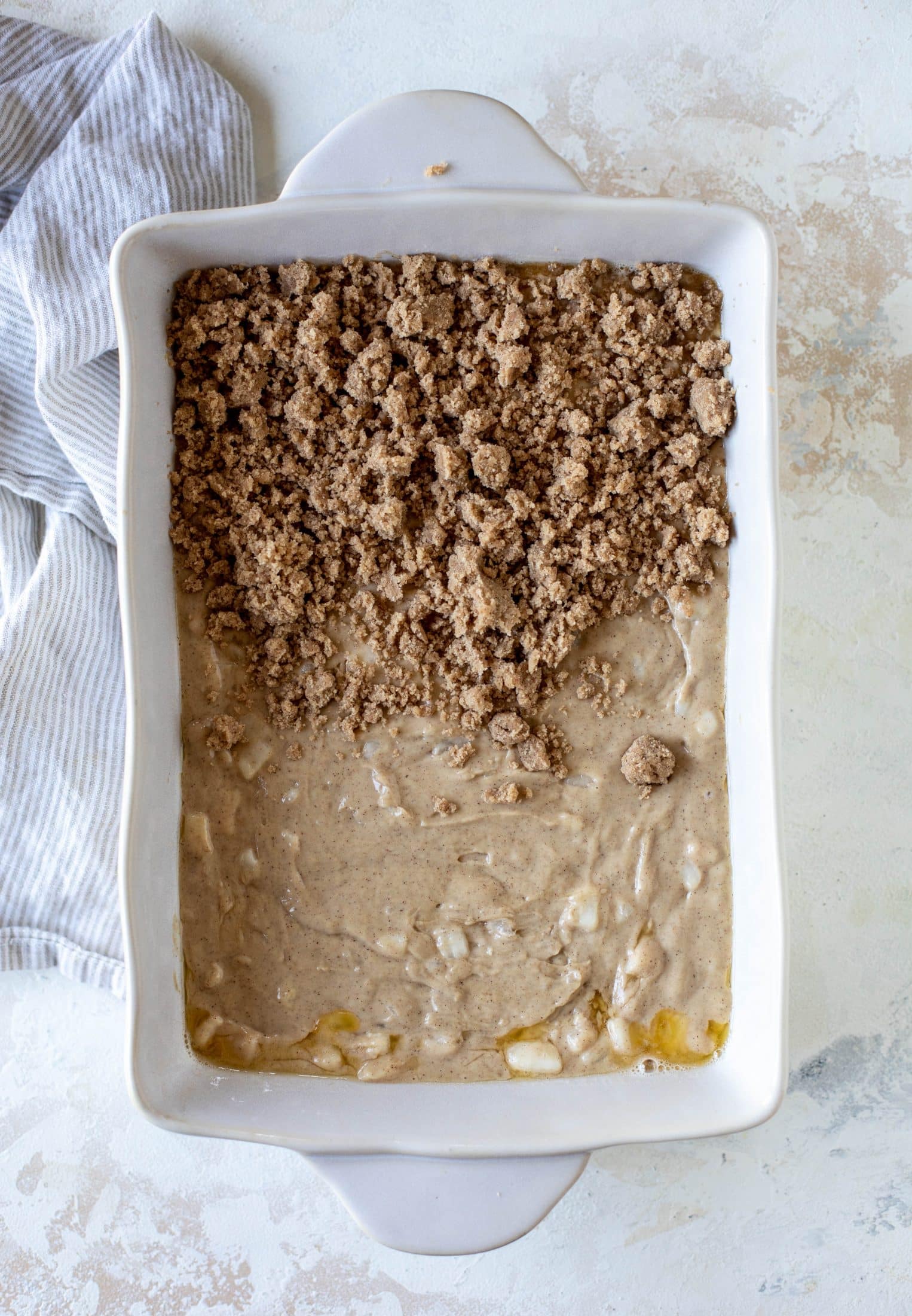 A pear coffee cake made with brown butter and greek yogurt. It's delicious for breakfast or brunch and the crumb topping is unbelievable.