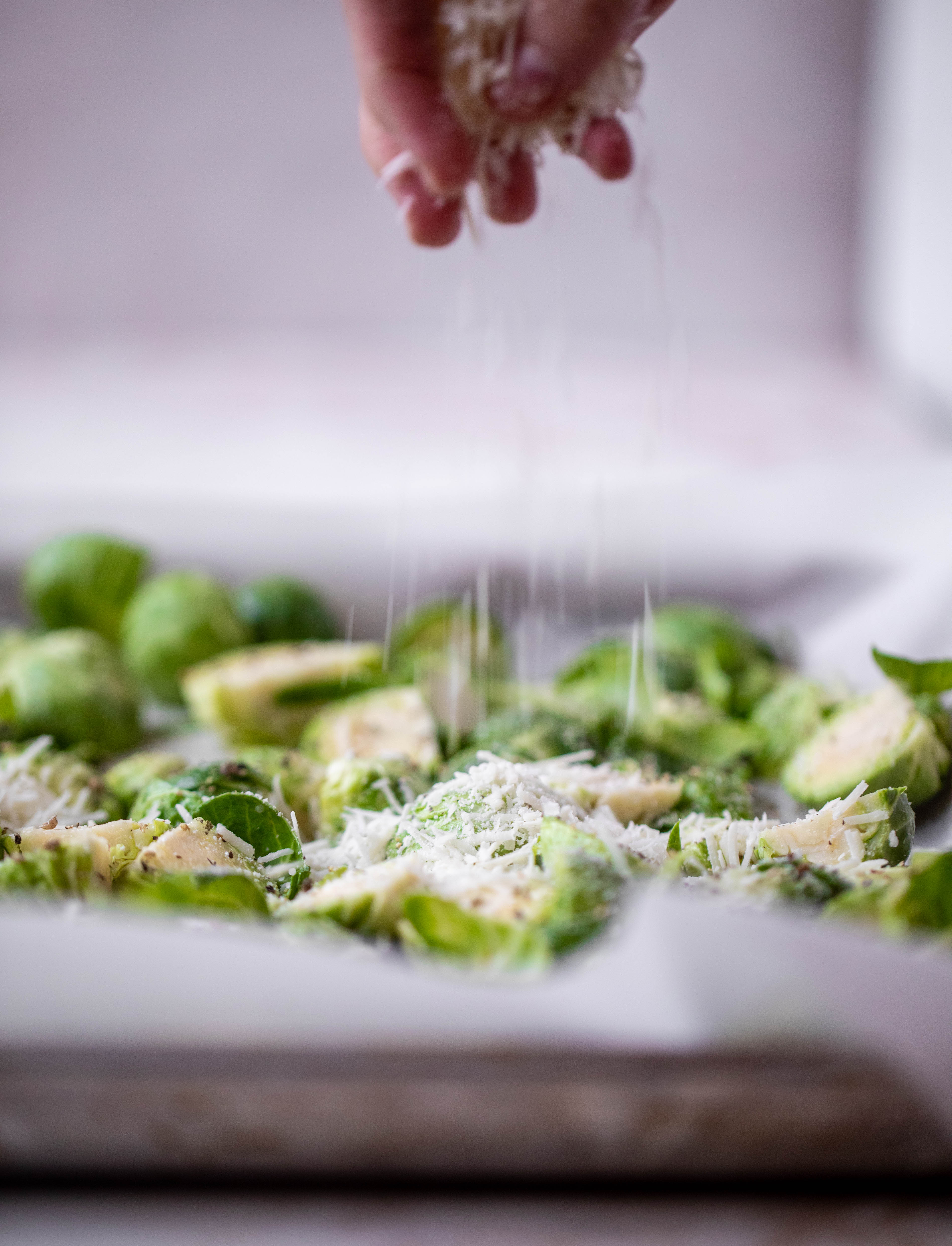 This cacio e pepe brussels are out of the world. Roasted until crisp, topped with tons of black pepper and salty pecorino cheese. Yum.