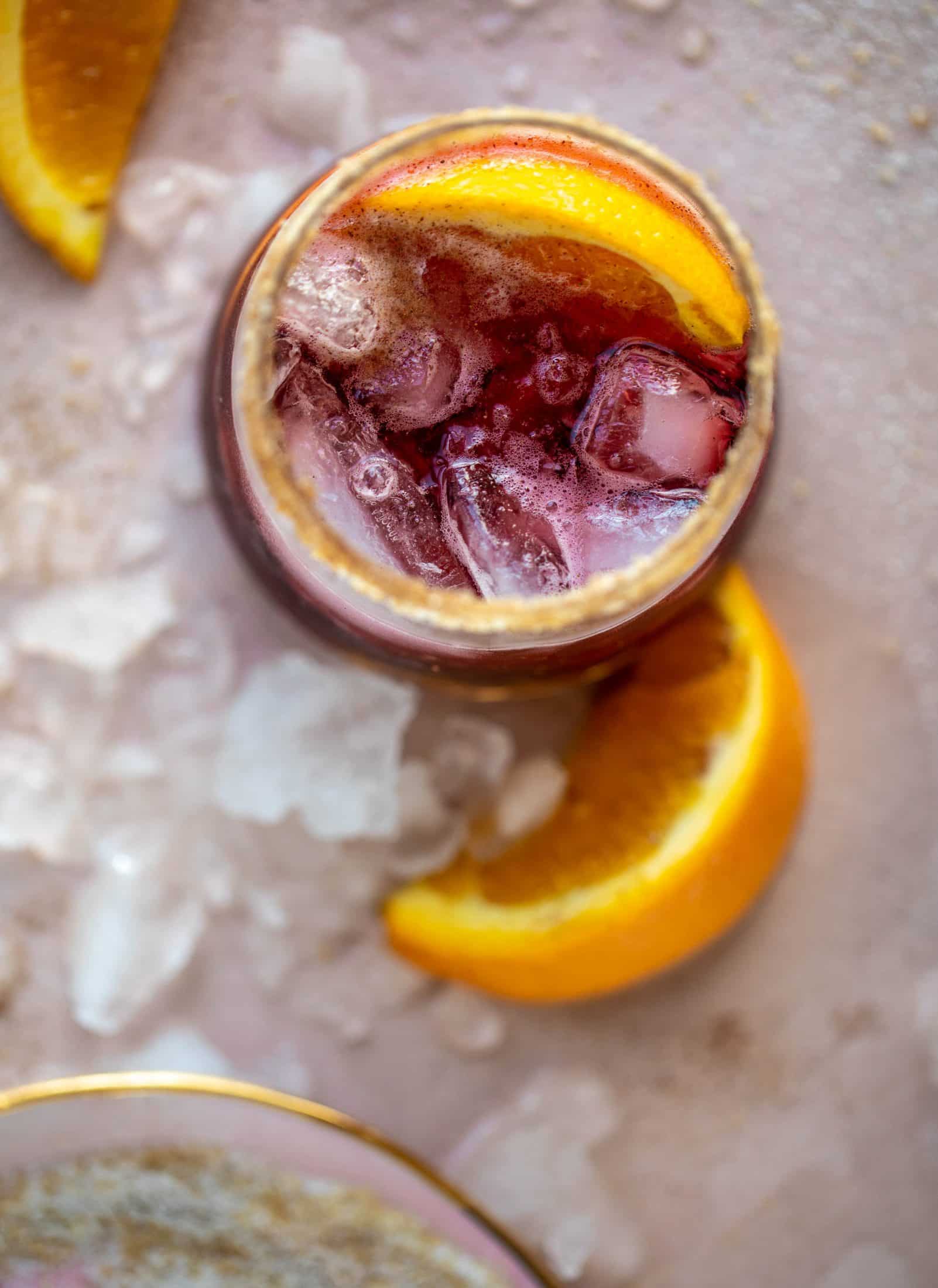 A refreshing and warming lambrusco smash, made with bubbly red wine, bourbon, orange soda and maple syrup. Tastes like the holidays!