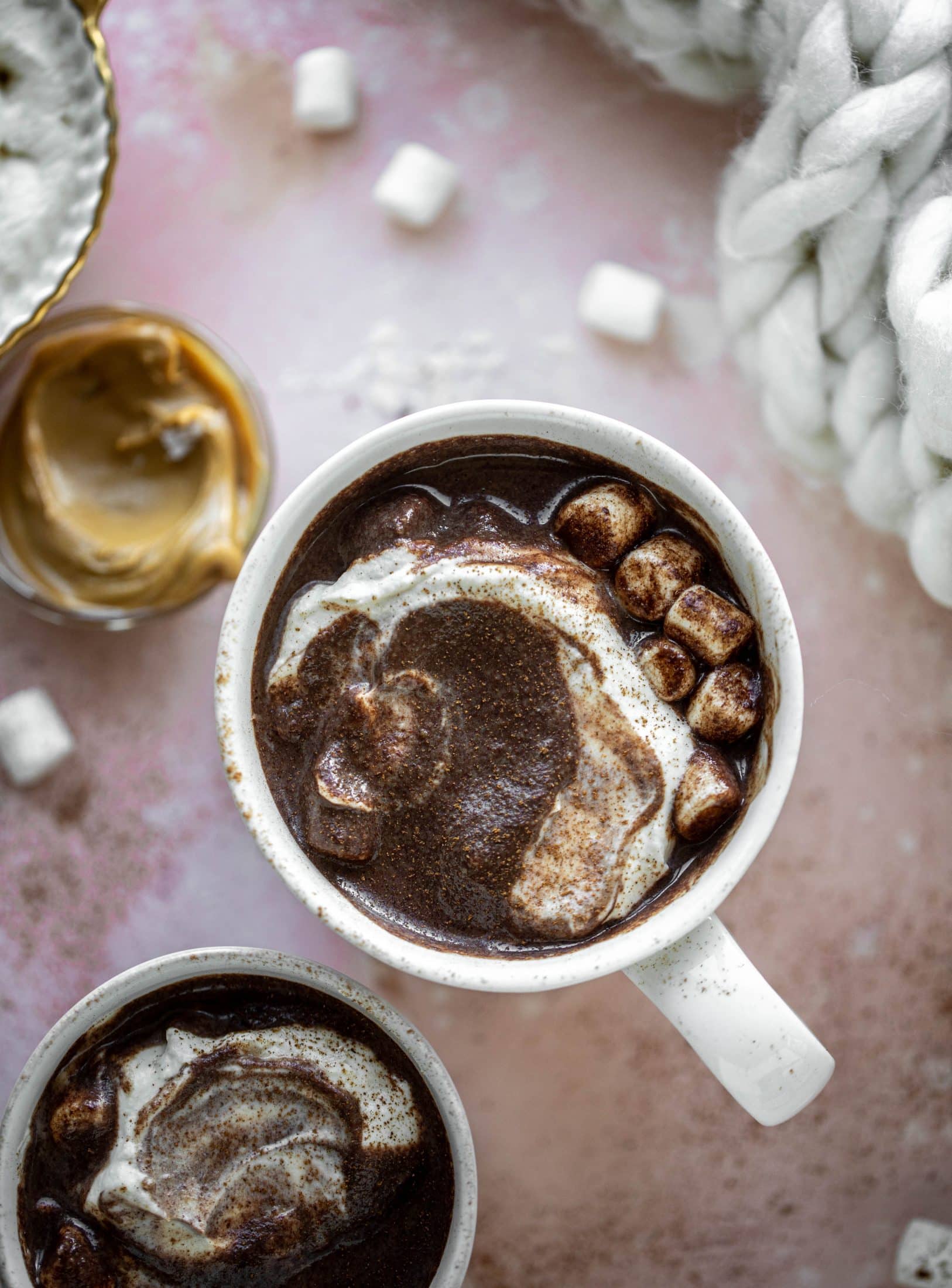 This salted peanut butter hot chocolate is a hug in a mug! It's super decadent, indulgent and cozy. Everyone's favorite flavors in one drink!