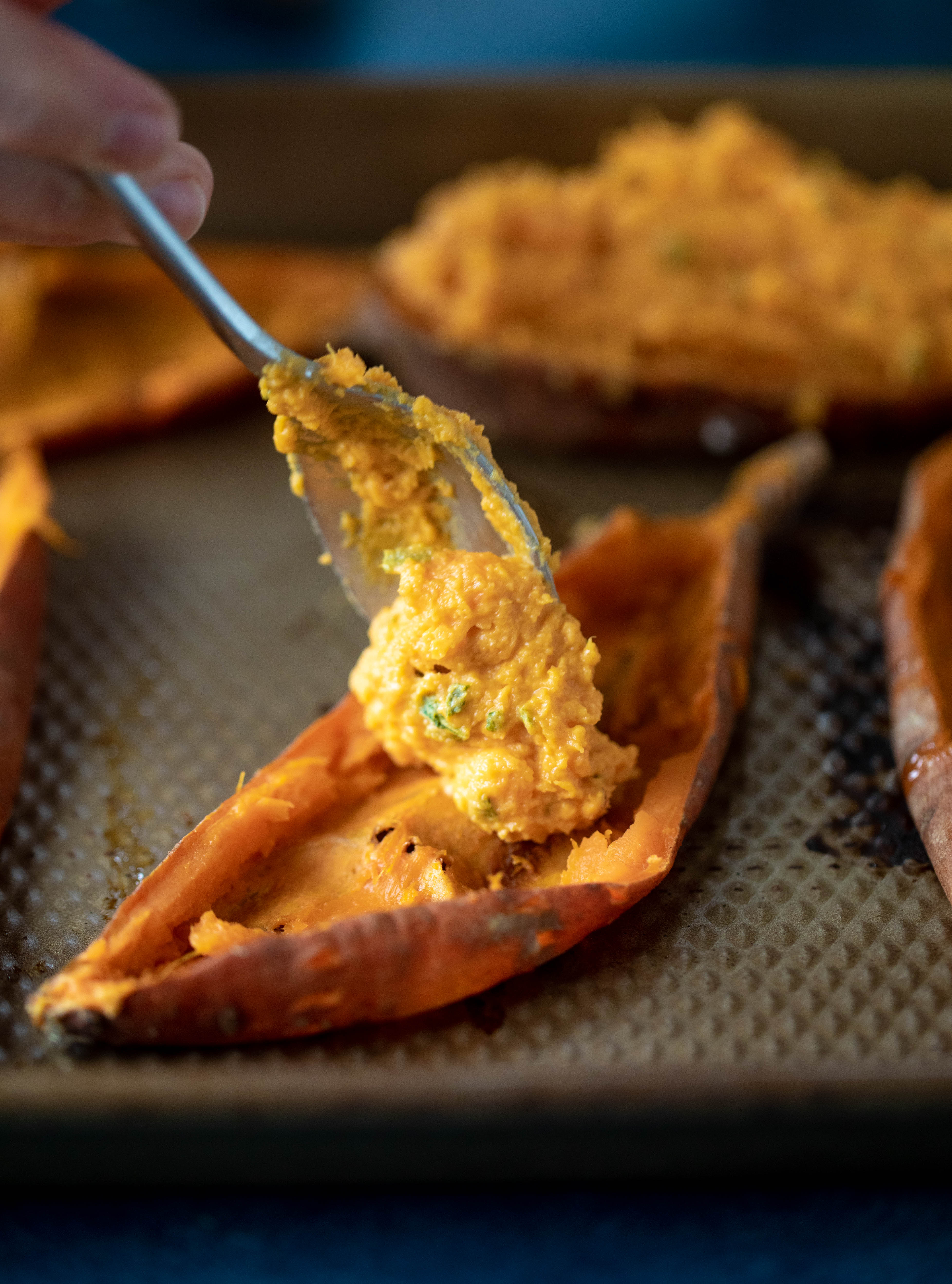 These twice baked sweet potatoes are whipped with crispy sage and pumpkin puree! Topped with cheese and baked until melty, they are super delish.