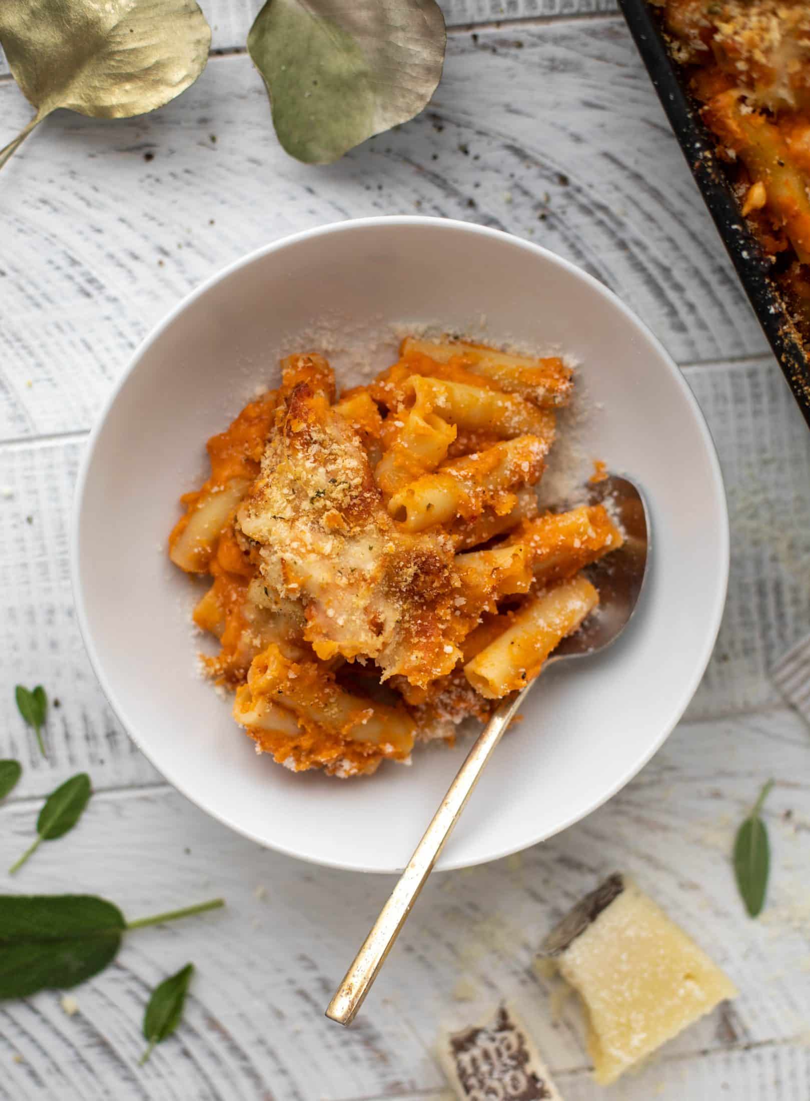 Butternut squash baked ziti is the ultimate comfort food! Squash, fire roasted tomatoes, parmesan and mozzarella make the best sauce ever.