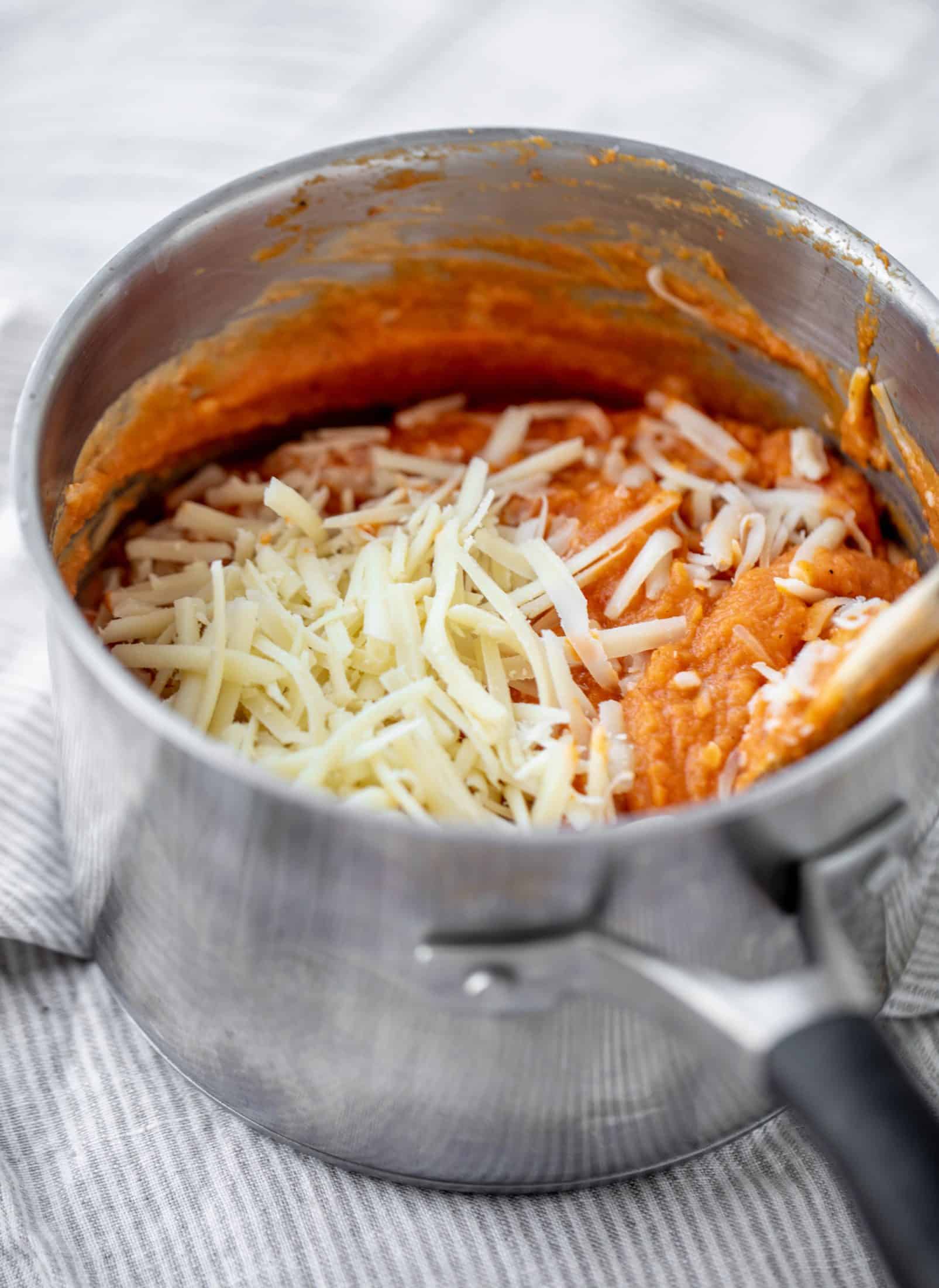 Butternut squash baked ziti is the ultimate comfort food! Squash, fire roasted tomatoes, parmesan and mozzarella make the best sauce ever.