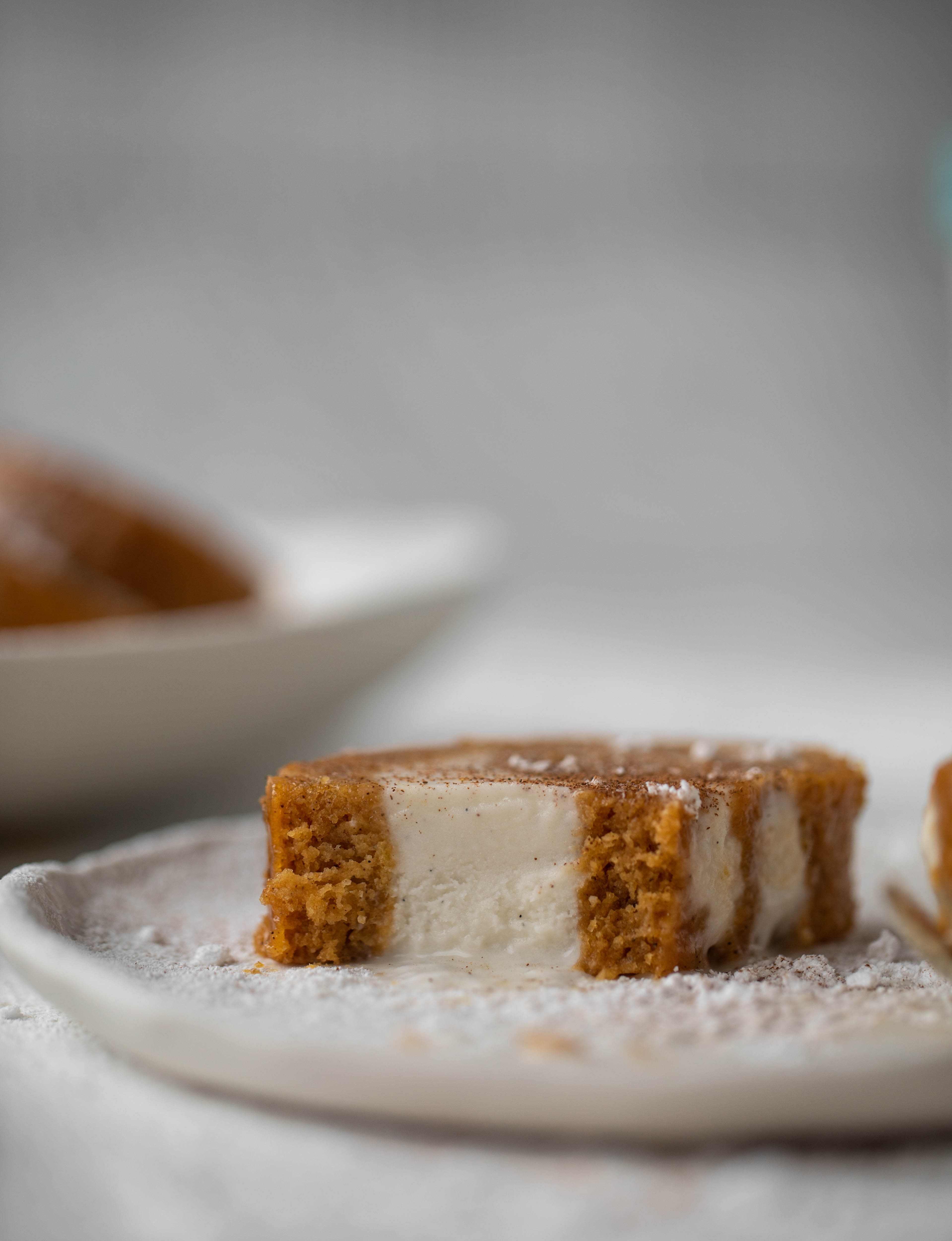 This frozen pumpkin roll is a delicious twist on the classic! Ice cream or non-dairy dessert is spread inside a classic pumpkin roll and serve frozen!