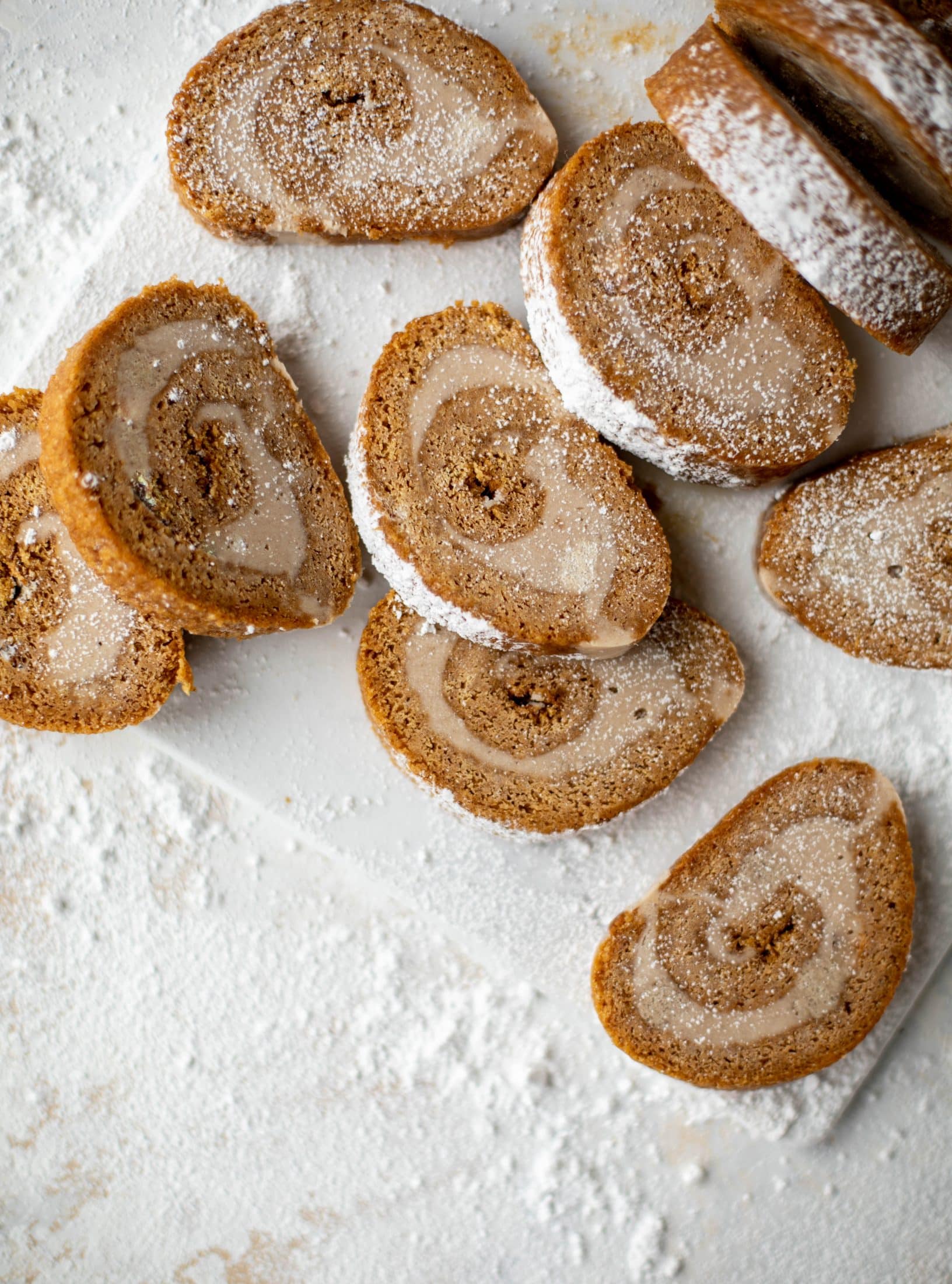 This frozen pumpkin roll is a delicious twist on the classic! Ice cream or non-dairy dessert is spread inside a classic pumpkin roll and serve frozen!
