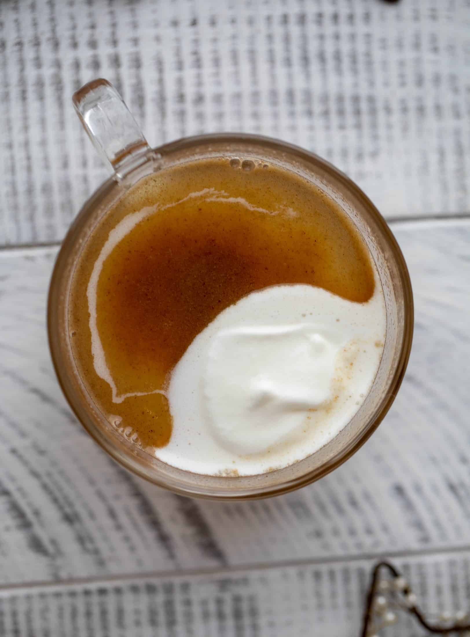 Hot buttered bourbon is a warming, spiced cozy drink that is perfect for chilly nights! Save batter in the fridge so you can have it whenever you'd like!