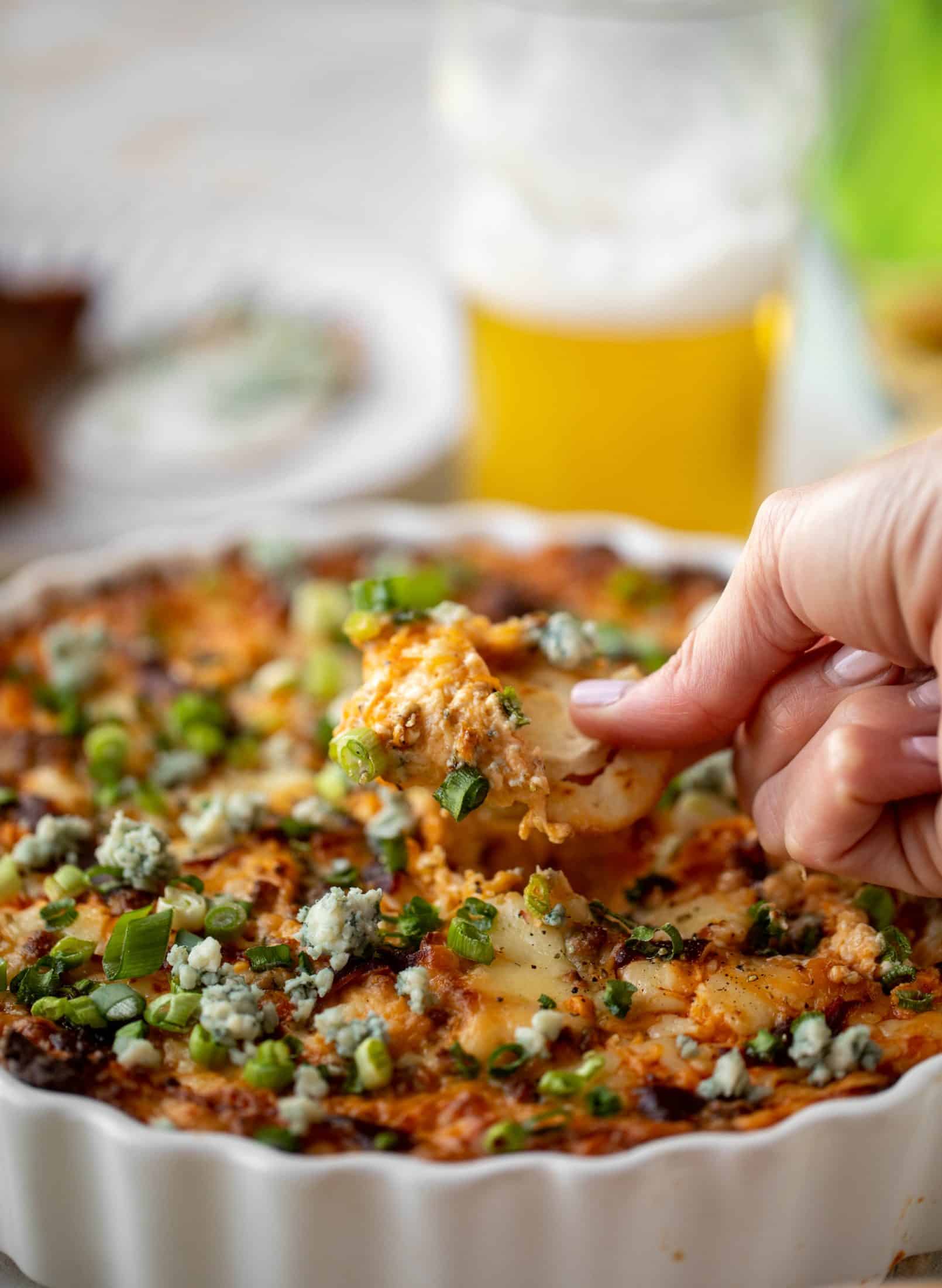 This loaded wing dip is full of buffalo wing sauce, BBQ sauce, honey mustard, ranch, blue cheese and tons of cheddar. All the flavors!