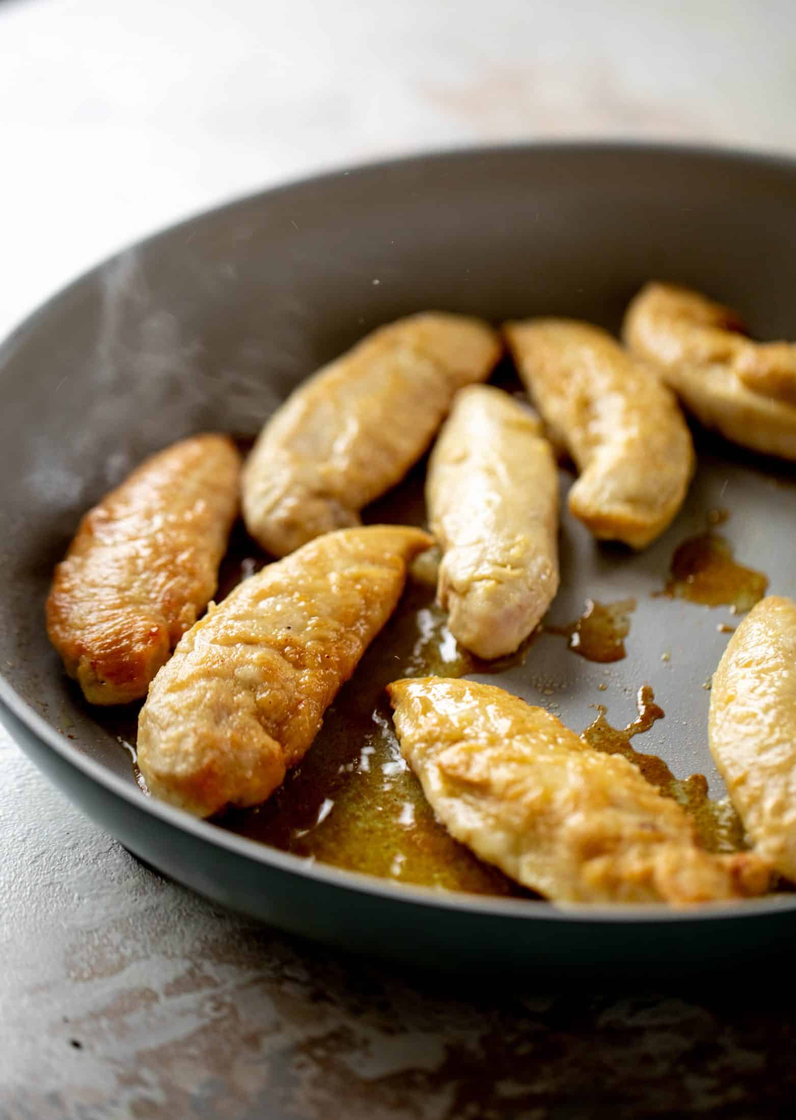 My mom's chicken marsala is easy and ridiculously flavorful! It's made without mushrooms and served alongside almond brown butter green beans.