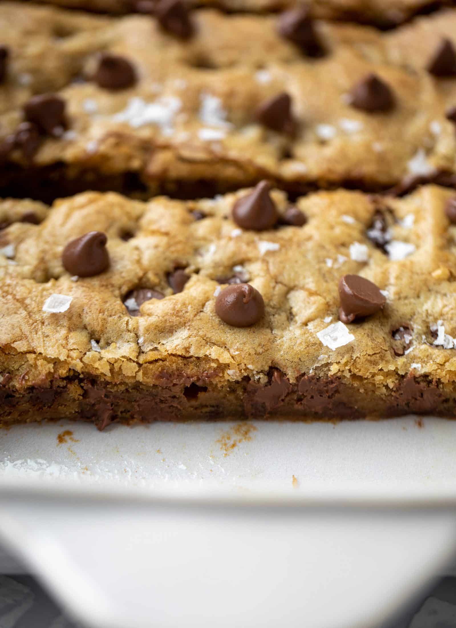 These brown butter chocolate chip cookie bars are chewy, chocolately and sprinkled with flaky salt. What else do you need in life?!