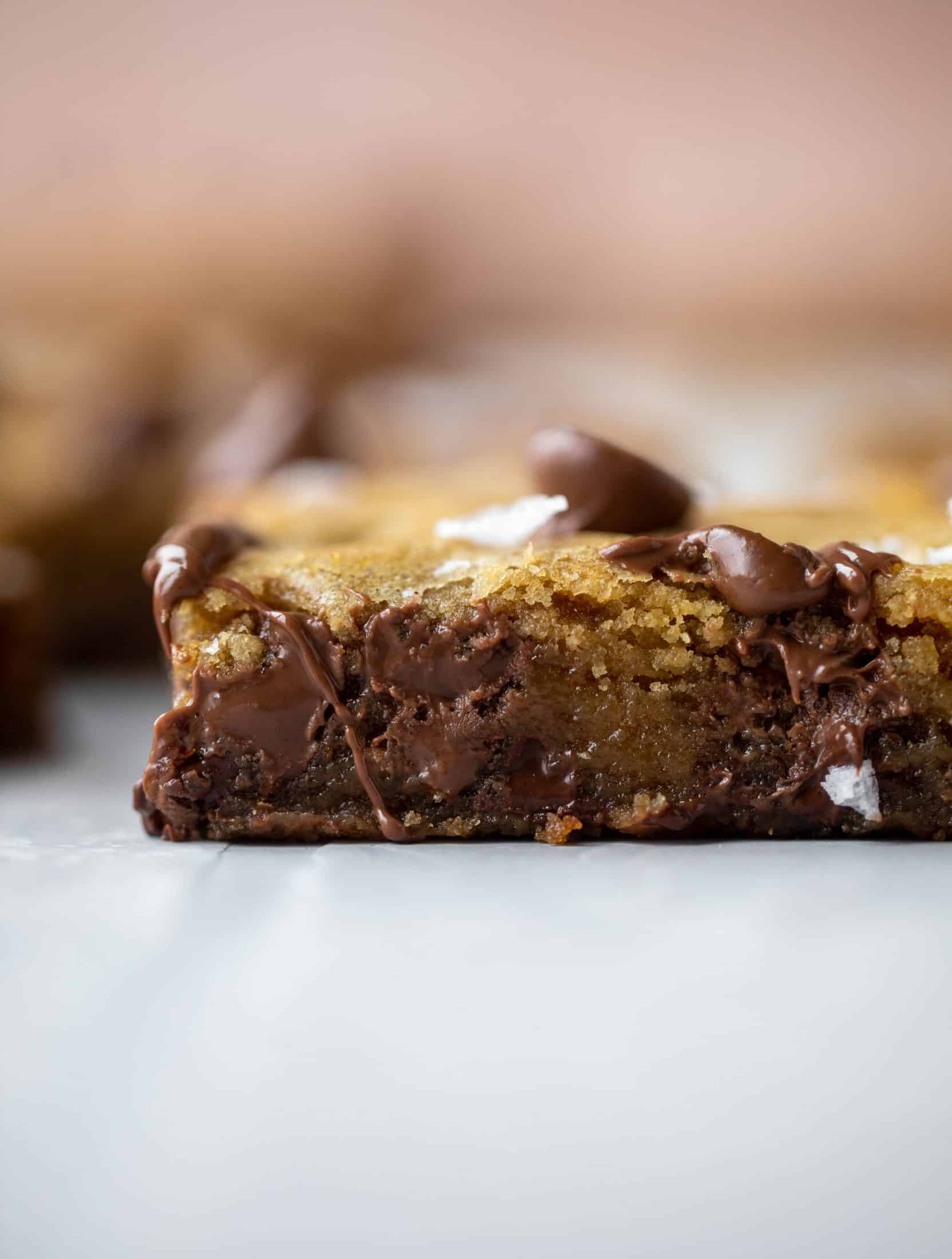 These brown butter chocolate chip cookie bars are chewy, chocolately and sprinkled with flaky salt. What else do you need in life?!