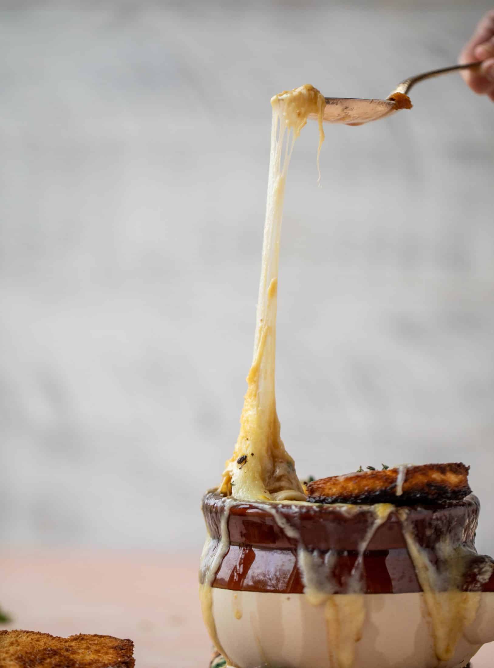 My favorite french onion soup starts with bourbon caramelized onions! Adorable heart croutons and tons of gruyere take it over the top.