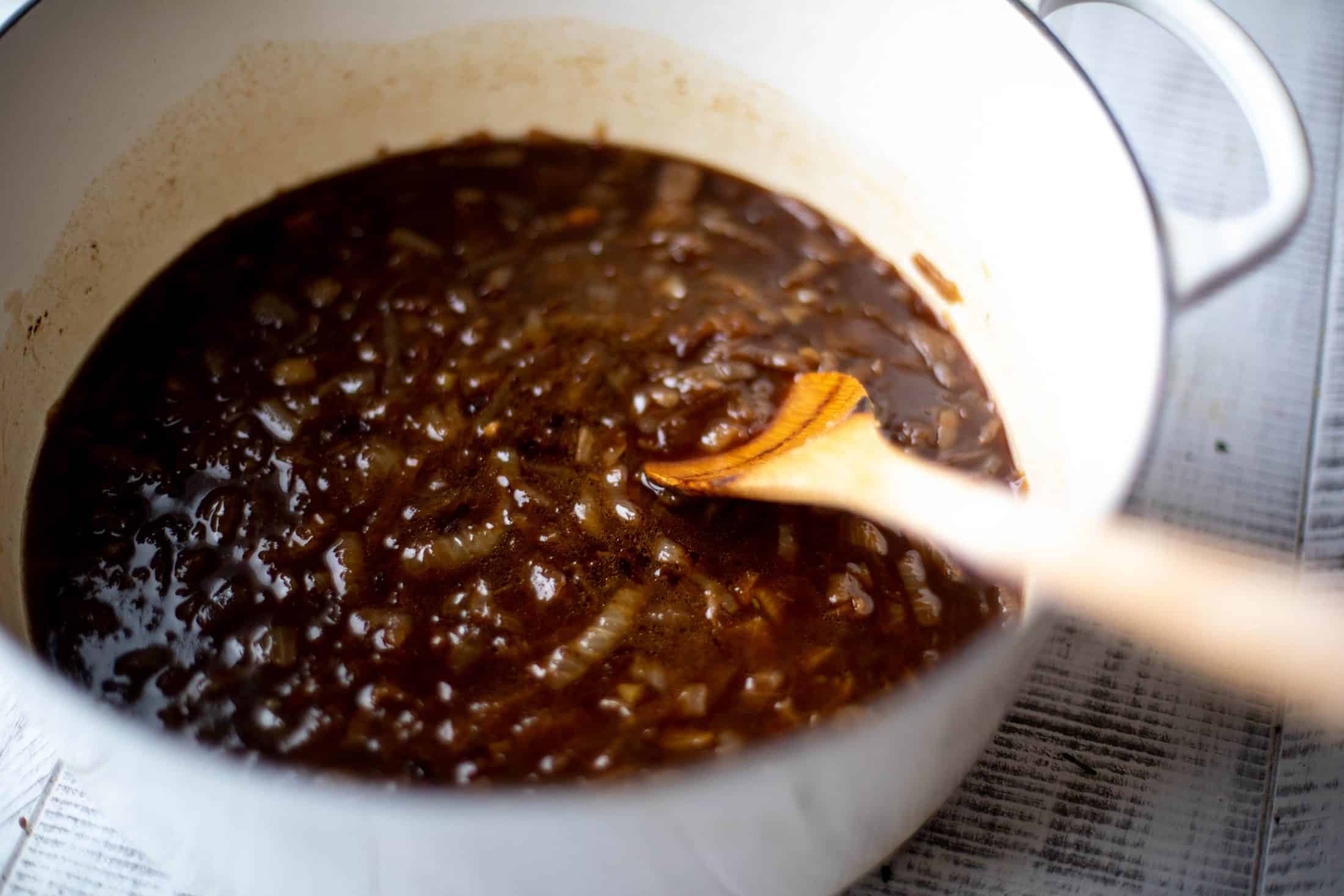 My favorite french onion soup starts with bourbon caramelized onions! Adorable heart croutons and tons of gruyere take it over the top.