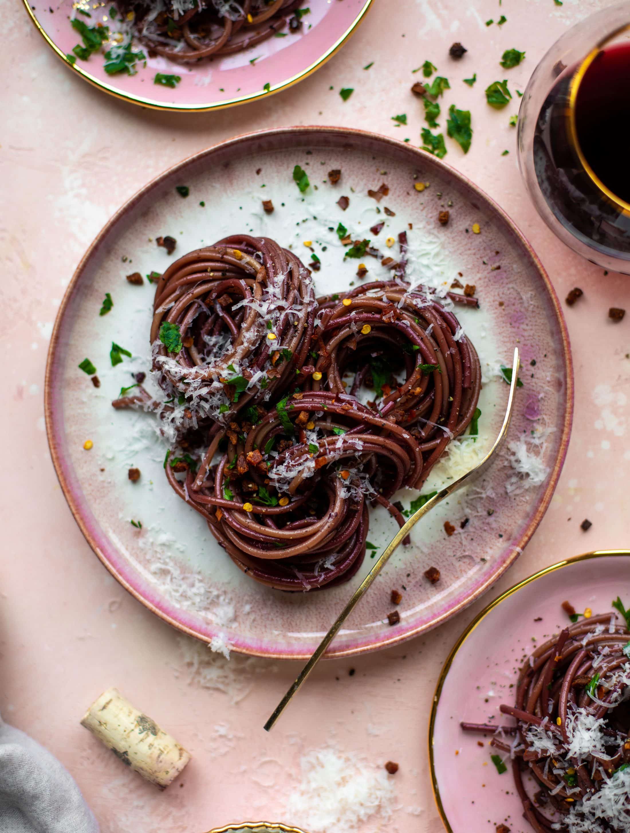 This red wine pasta is an easy, flavorful dinner! Red wine cooked down with garlic and butter until sauce-like. Throw in noodles and you have dinner!