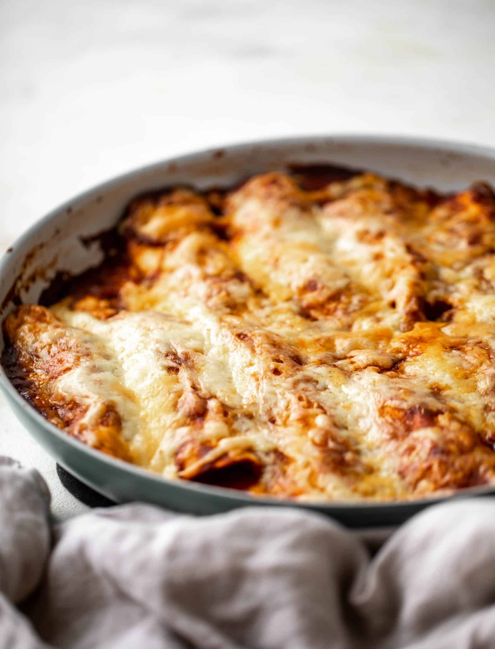 Chipotle chicken skillet enchiladas are loaded with flavor and come together so quickly! They are the perfect spicy weeknight meal.