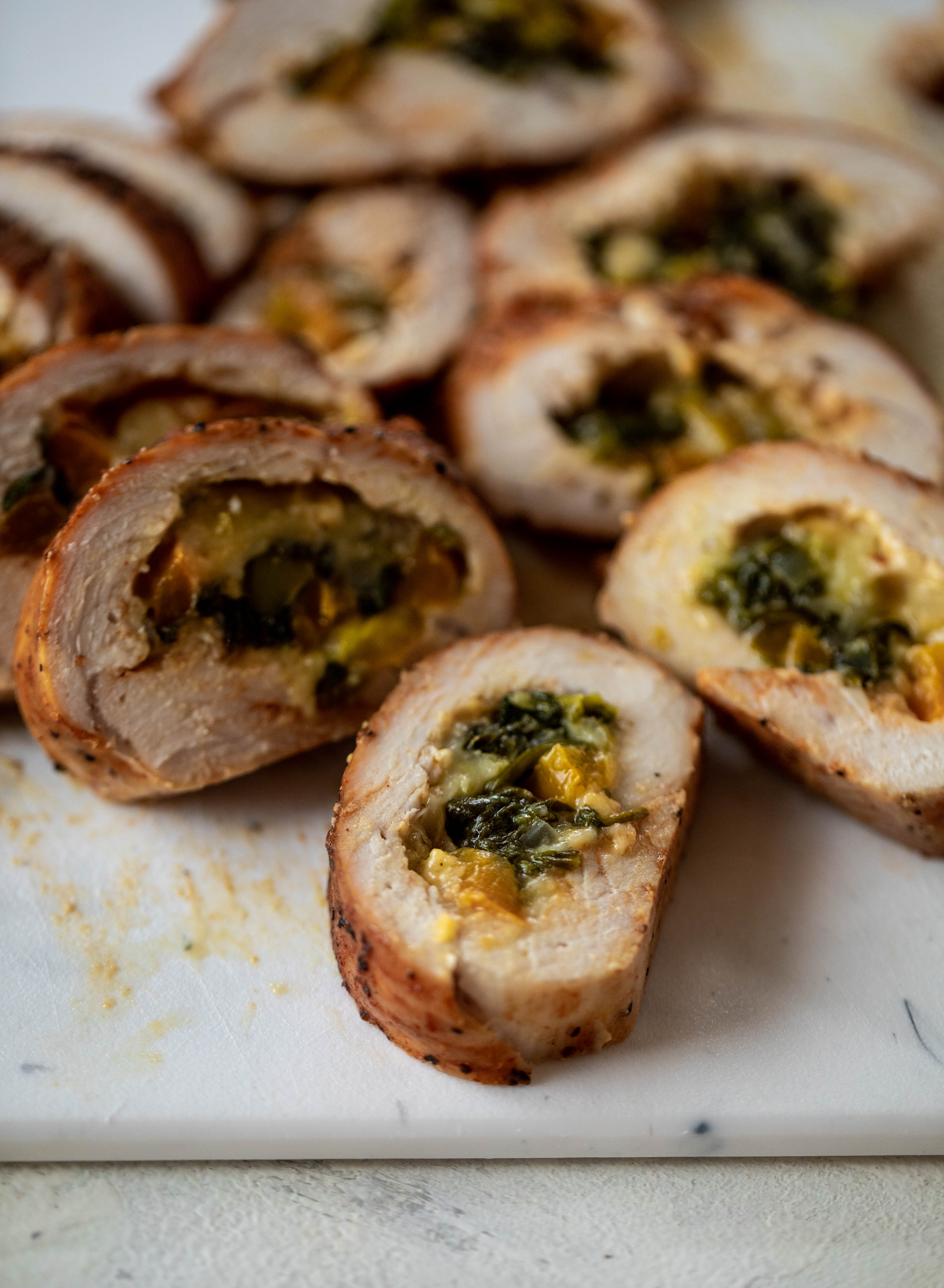 These southwest stuffed turkey tenderloins are so flavorful and filled with spinach, peppers, onions and cheddar! Serve alongside a lime black bean salad.