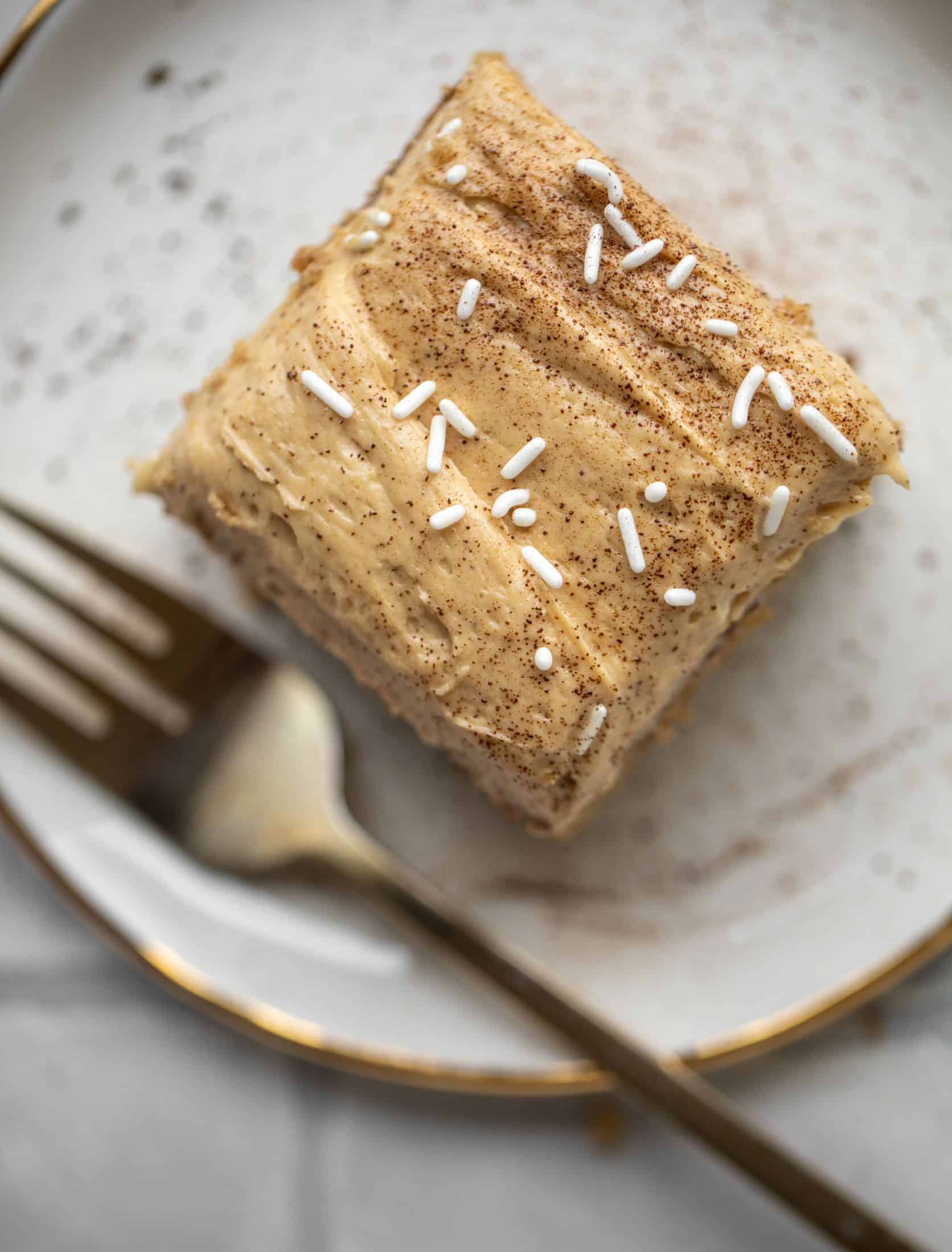 This banana cake is a delicious twist on banana bread! Covered with coffee cream cheese frosting, it’s an easy and wonderful treat.
