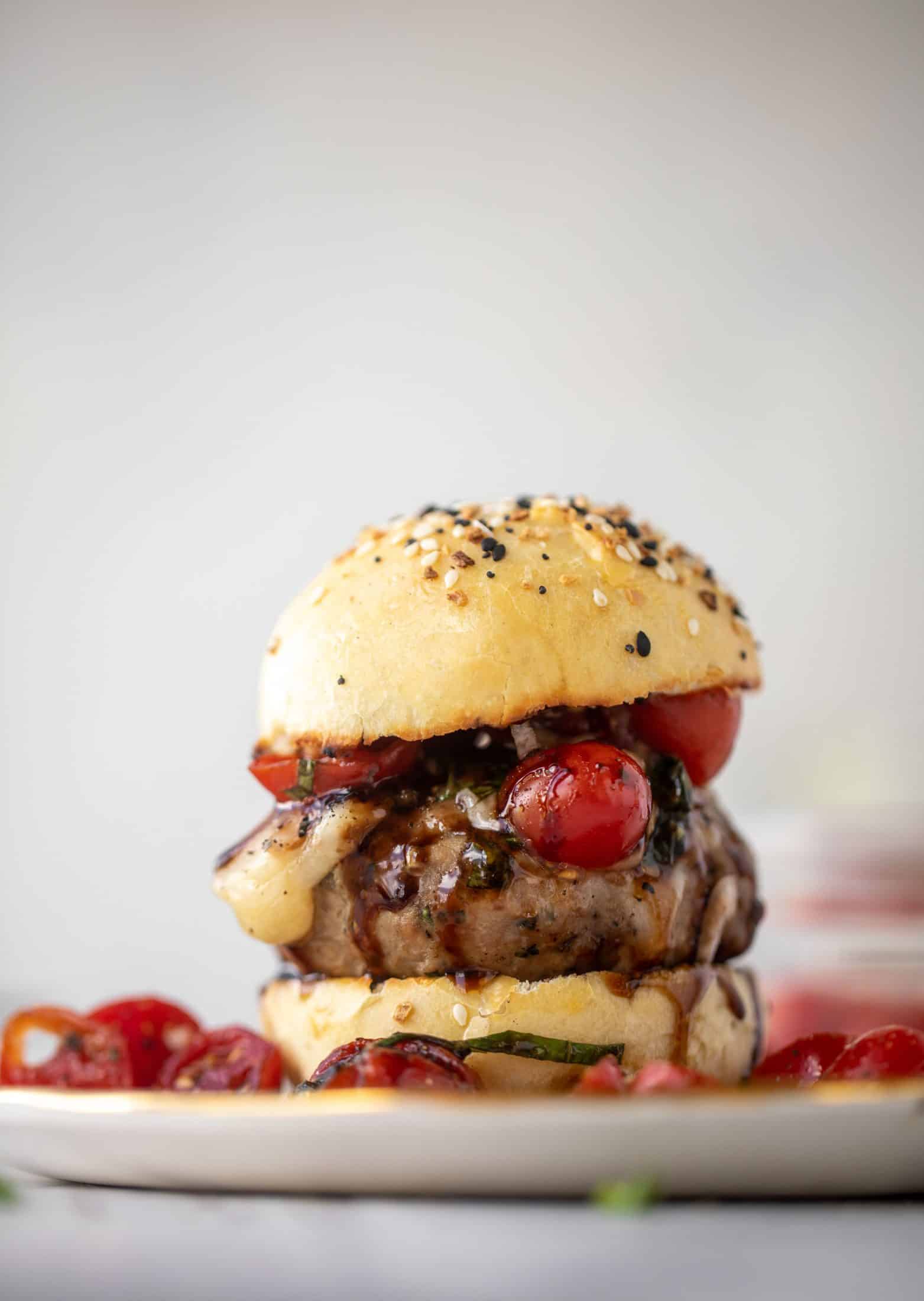 bruschetta chicken burger on brioche buns