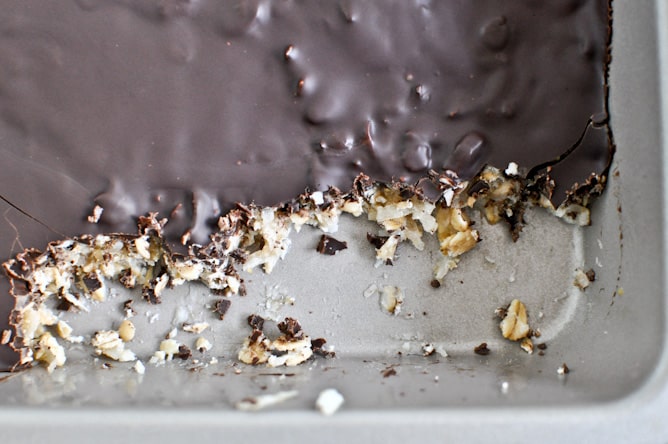 Thin + Chewy Chocolate Drenched Coconut Oatmeal Squares I howsweeteats.com Thin + Chewy Chocolate Drenched Coconut Oatmeal Squares I howsweeteats.com