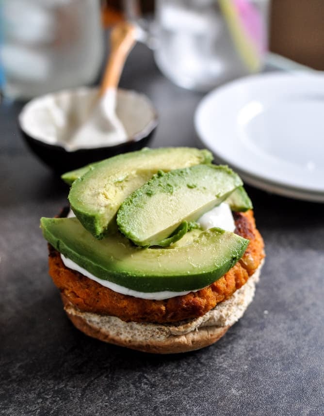 Smoky Sweet Potato Burgers with Roasted Garlic Cream and Avocado I howsweeteats.com