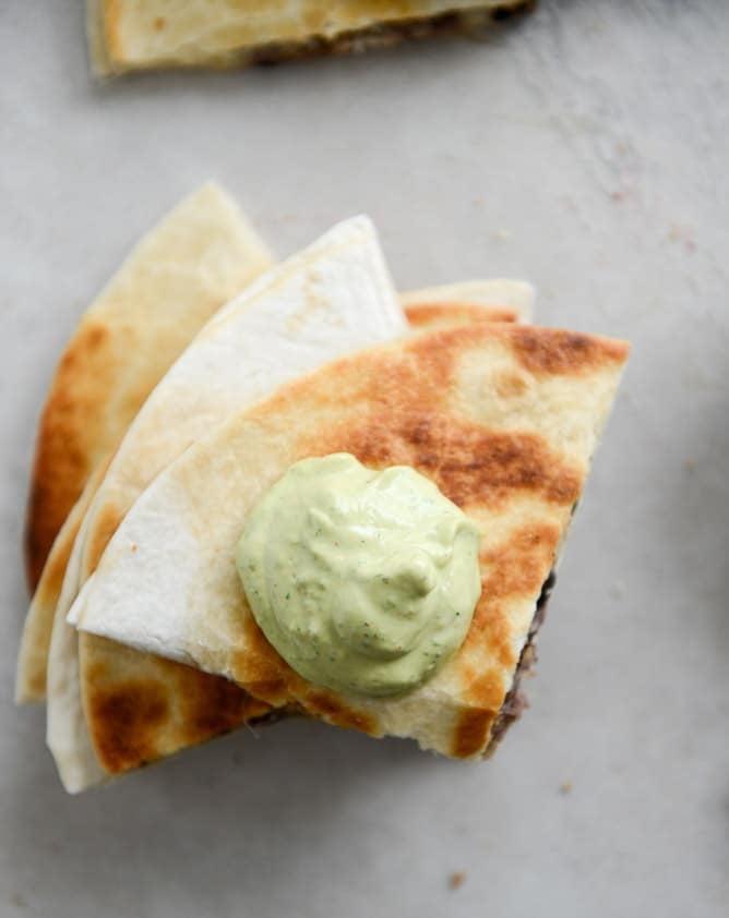 Cheesy Double Bean Quesadillas with Homemade Avocado Ranch I howsweeteats.com Cheesy Double Bean Quesadillas with Homemade Avocado Ranch I howsweeteats.com
