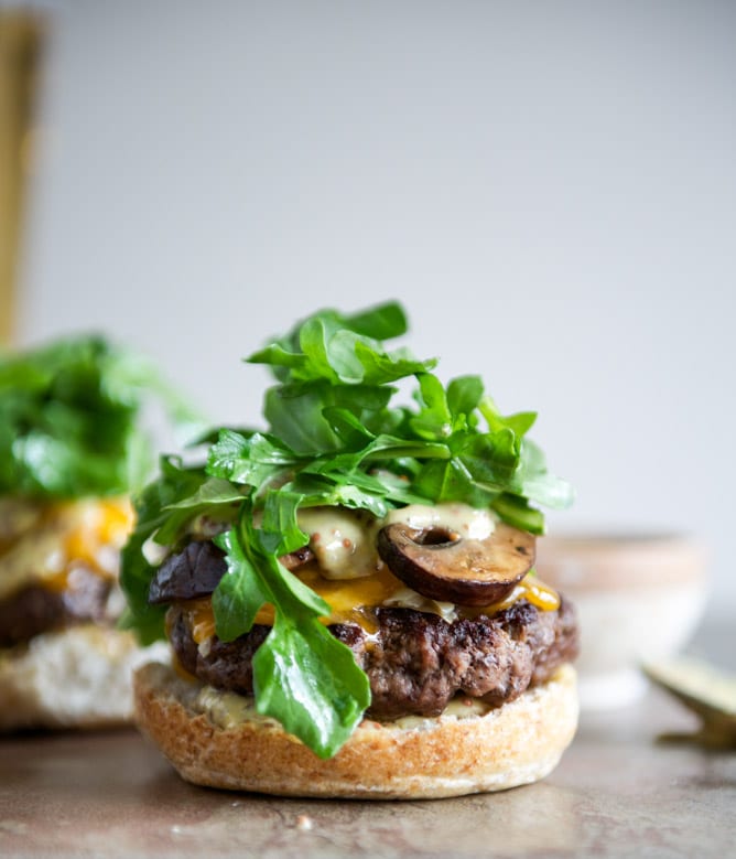 Cheeseburgers with Sautéed Mushrooms, Arugula and Dijon Aioli I howsweeteats.com Cheeseburgers with Sautéed Mushrooms, Arugula and Dijon Aioli I howsweeteats.com